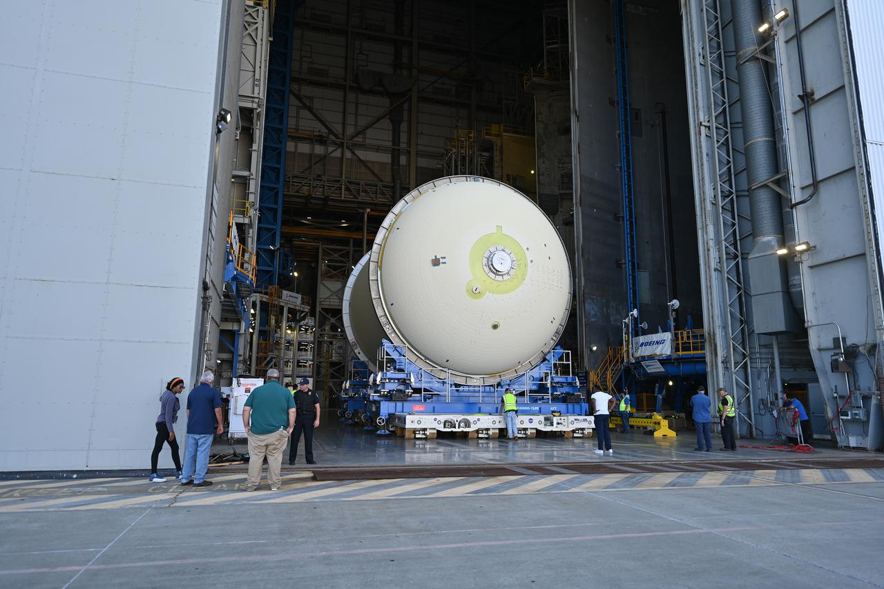 Teams move a liquid oxygen tank – designated for the core stage of NASA’s SLS (Space Launch System) rocket for its Artemis III mission – from the thermal protection system application cell at NASA’s Michoud Assembly Facility in New Orleans to the site’s 210-foot-tall Vertical Assembly Building on July 9. Next, NASA’s SLS prime contractor, Boeing, will vertically install the tank’s aft sump subassembly.  The propellant tank is one of five major elements that make up the 212-foot-tall rocket stage. The core stage, along with its four RS-25 engines, produce more than two million pounds of thrust to help launch NASA’s Orion spacecraft, astronauts, and supplies beyond Earth’s orbit and to the lunar surface for Artemis. 