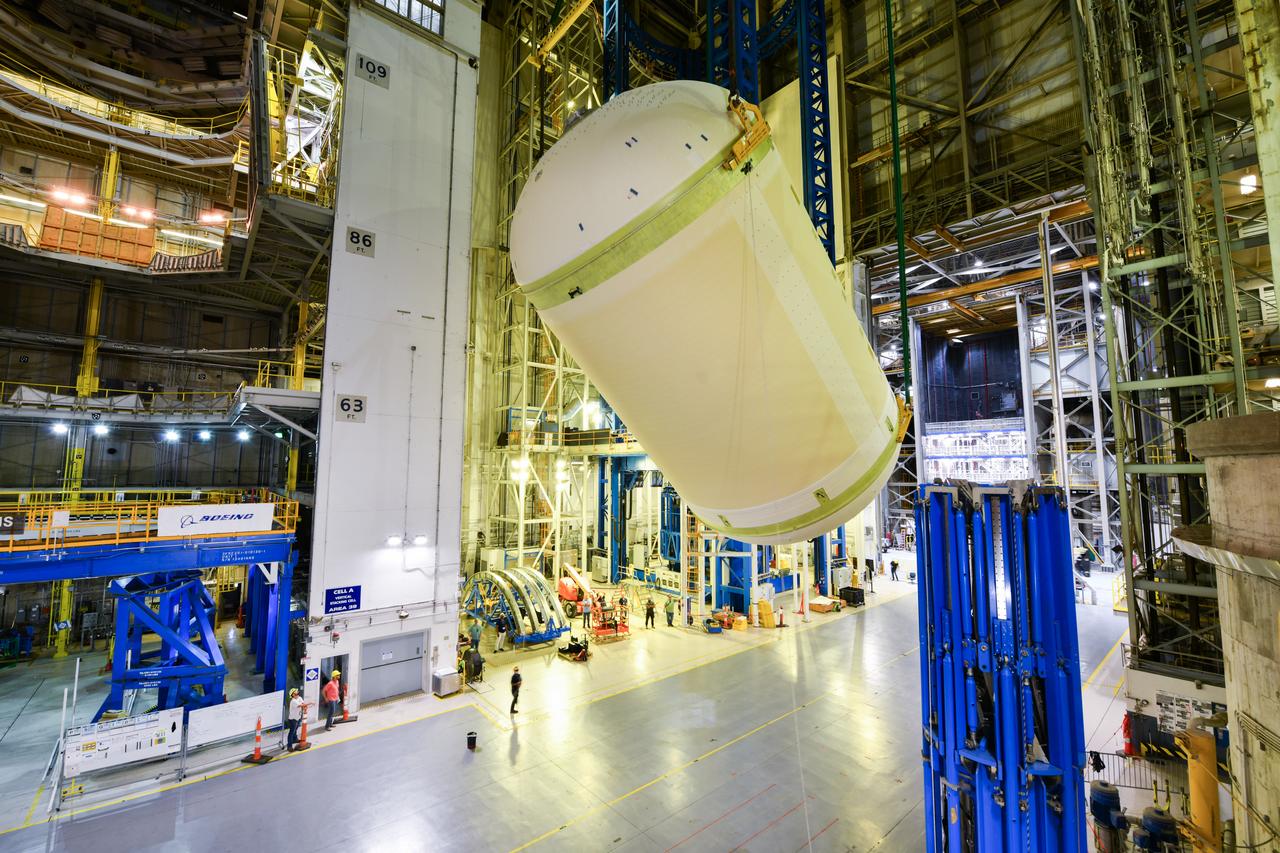 Teams at NASA’s Michoud Assembly Facility in New Orleans lift a liquid oxygen tank from a horizontal to a vertical position and place it into a production cell on July 12. The process, called a breakover, will allow technicians to rappel into the empty tank and install its aft sump subassembly, securing it from the inside. This tank will be used on the core stage of NASA’s SLS (Space Launch System) rocket for its Artemis III mission. The propellant tank is one of five major elements that make up the 212-foot-tall rocket stage. The core stage, along with its four RS-25 engines, produce more than two million pounds of thrust to help launch NASA’s Orion spacecraft, astronauts, and supplies beyond Earth’s orbit and to the lunar surface for Artemis. 