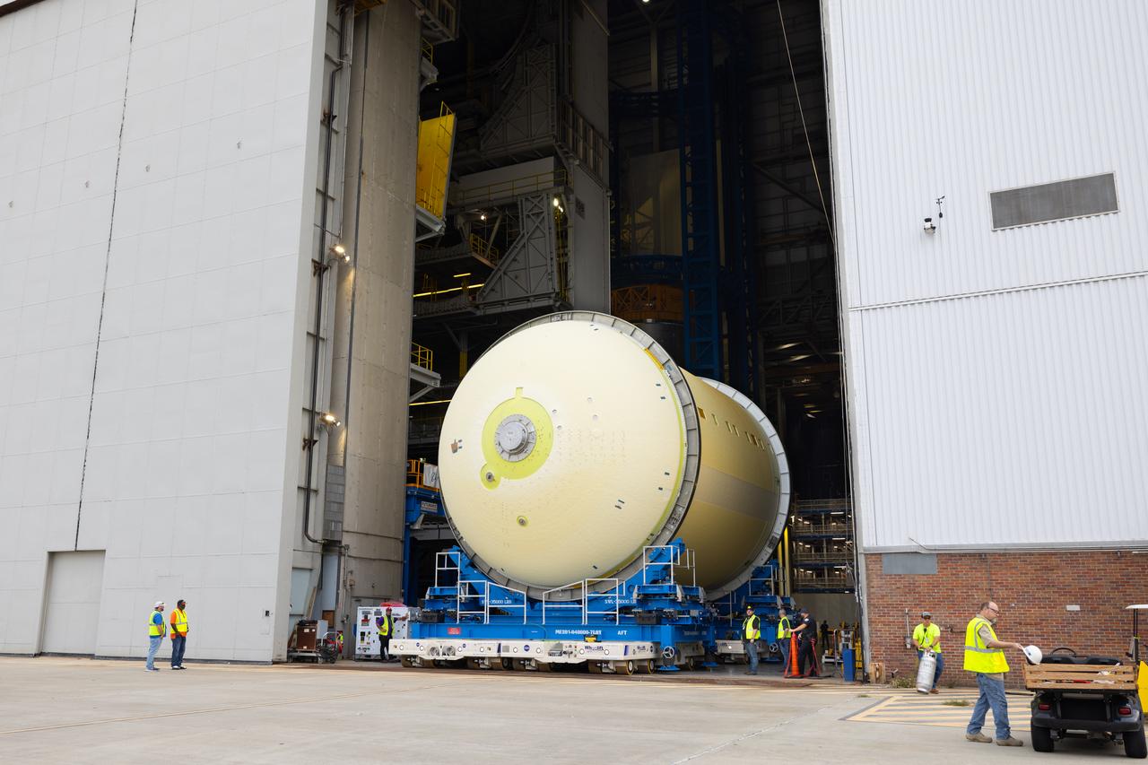Move crews at NASA’s Michoud Assembly Facility in New Orleans move a liquid oxygen tank out of the facility’s vertical assembly building on Aug. 27, 2025. Using self-propelled mobile transporters teams transferred the tank to the final assembly production area. There, it will undergo integration of the forward dome by SLS (Space Launch System) prime contractor, Boeing. Eventually, the liquid oxygen tank will be moved back to the high bay where it will be mated with the intertank and forward skirt to complete the forward join of the Artemis III core stage. The propellant tank is one of five major elements that make up the 212-foot-tall rocket stage. The core stage, along with its four RS-25 engines, produce more than two million pounds of thrust to help launch NASA’s Orion spacecraft, astronauts, and supplies beyond Earth’s orbit and to the lunar surface for Artemis.