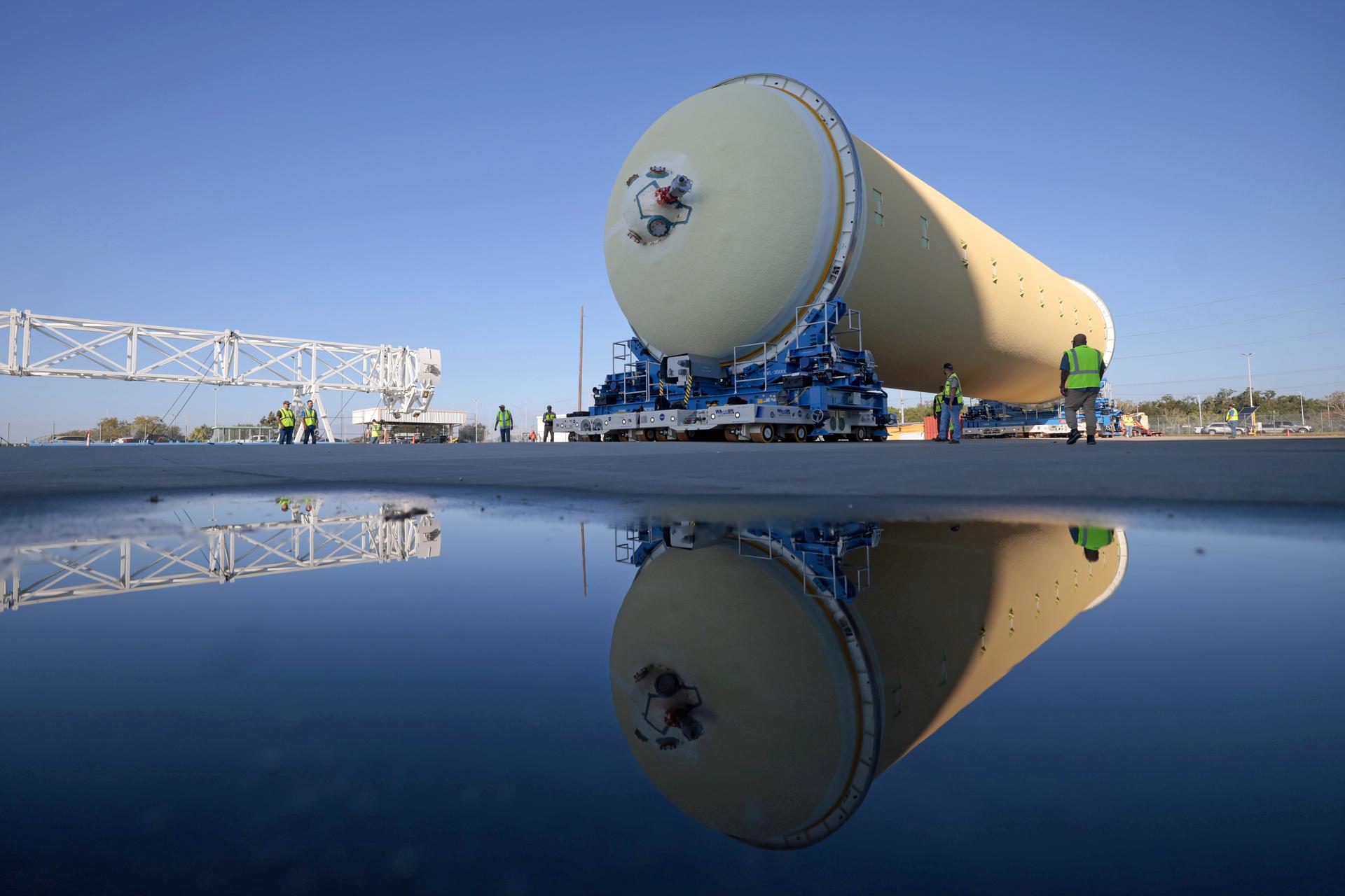 Teams at NASA’s Michoud Assembly Facility in New Orleans move a liquid hydrogen tank for the agency’s SLS (Space Launch System) rocket into the factory’s vertical assembly building on Sep. 26, 2025. The tank, which is designated for the agency’s Artemis III mission, is lifted and loaded into a production cell where it will be mated with the LH2 Transport Adapter Assembly for future transportation to NASA’s Kennedy Space Center. The engine section flight hardware structure was completed in 2022 and was shipped to Kennedy where teams continue to integrate vital systems. The propellant tank is one of five major elements that make up the 212-foot-tall rocket stage. The core stage, along with its four RS-25 engines, produce more than two million pounds of thrust to help launch NASA’s Orion spacecraft, astronauts, and supplies beyond Earth’s orbit and to the lunar surface for Artemis. Image credit: NASA/Michael DeMocker