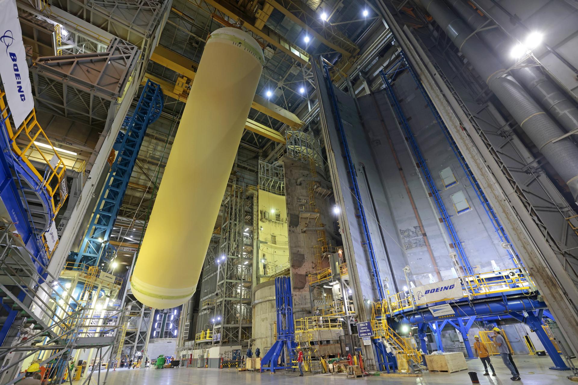 Teams at NASA’s Michoud Assembly Facility in New Orleans move a liquid hydrogen tank for the agency’s SLS (Space Launch System) rocket inside the factory’s vertical assembly building on Sep. 28, 2025. The tank, which is designated for the agency’s Artemis III mission, is being lifted and loaded into a production cell where it will be mated with the LH2 Transport Adapter Assembly for future transportation to NASA’s Kennedy Space Center. The engine section flight hardware structure was completed in 2022 and was shipped to Kennedy where teams continue to integrate vital systems.  The propellant tank is one of five major elements that make up the 212-foot-tall rocket stage. The core stage, along with its four RS-25 engines, produce more than two million pounds of thrust to help launch NASA’s Orion spacecraft, astronauts, and supplies beyond Earth’s orbit and to the lunar surface for Artemis.     Image credit: NASA/Michael DeMocker