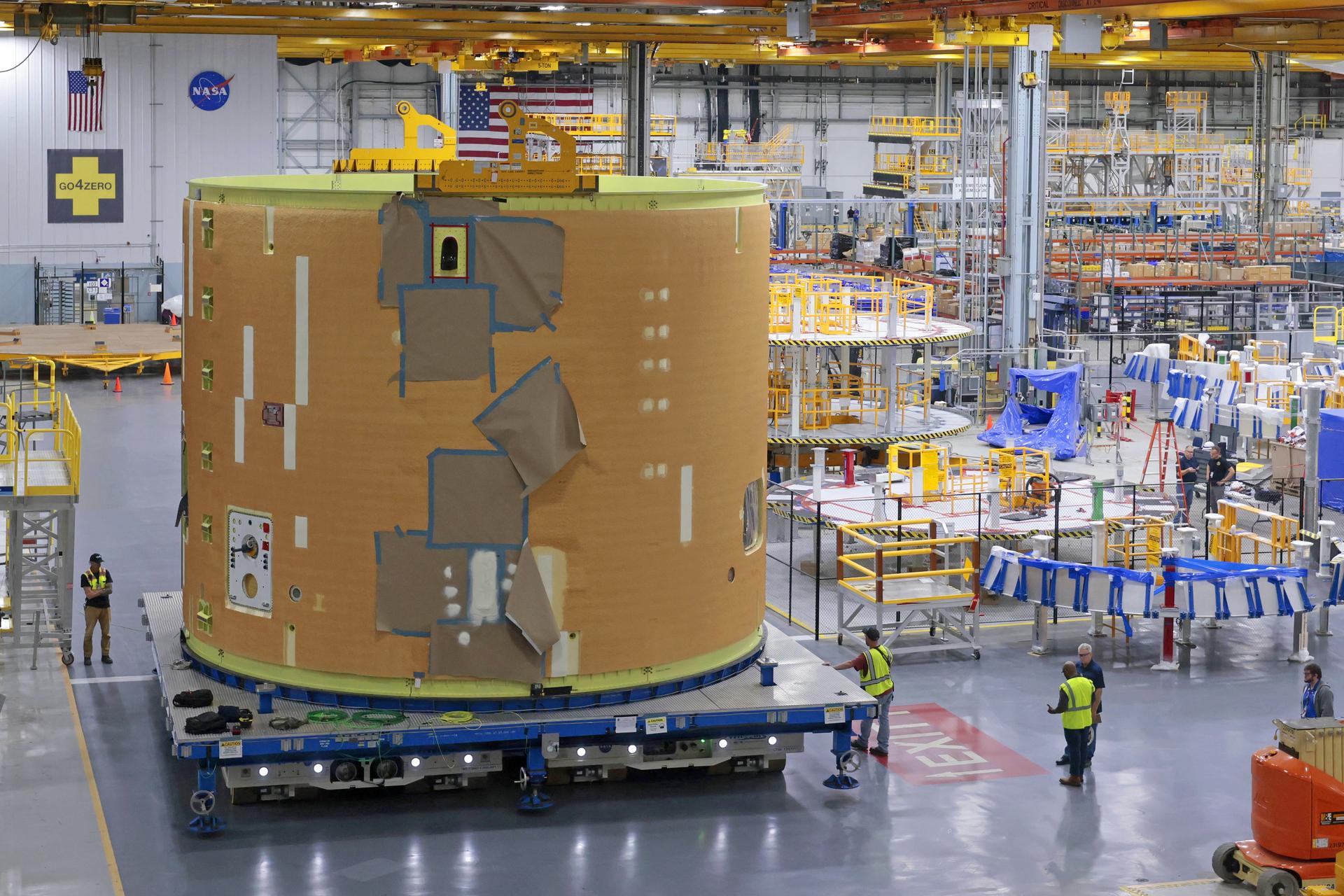 Teams at NASA’s Michoud Assembly Facility in New Orleans move the 21.8-foot-tall intertank for the core stage of the agency’s Artemis III mission into the vertical assembly building on Oct. 21. Inside the production cell, NASA’s prime contractor for the SLS (Space Launch System) core stage, Boeing, will mate the intertank to the liquid oxygen tank and the forward skirt in a process called a “forward join.”   The intertank houses avionics and electronics, serves as an attachment point for the solid rocket boosters, and is one of five major elements that make up the 212-foot-tall rocket stage. The core stage, along with its four RS-25 engines, produce more than two million pounds of thrust to help launch NASA’s Orion spacecraft, astronauts, and supplies beyond Earth’s orbit and to the lunar surface for Artemis.    Image credit: NASA/Michael DeMocker