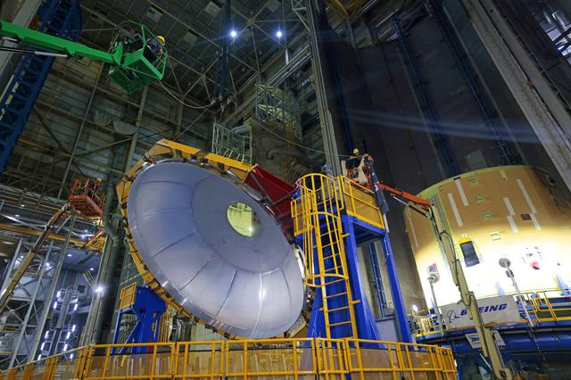 NASA image: Core Stage Four Liquid Hydrogen Tank Aft Dome Lifts into Vertical Assembly Center 