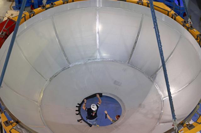 NASA image: Core Stage Four Liquid Hydrogen Tank Aft Dome Lifts into Vertical Assembly Center 