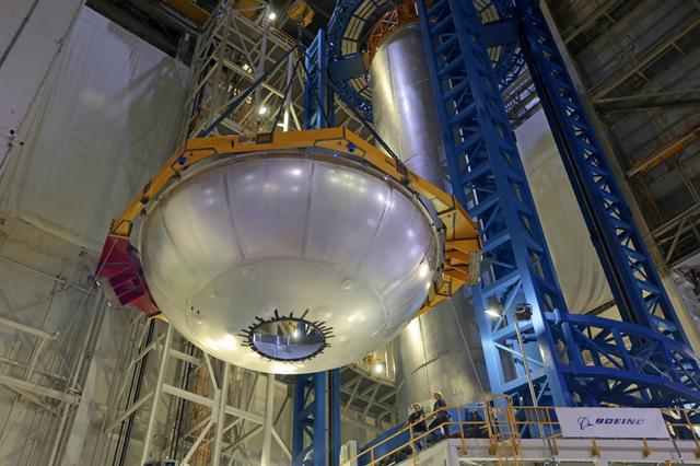 NASA image: Core Stage Four Liquid Hydrogen Tank Aft Dome Lifts into Vertical Assembly Center 