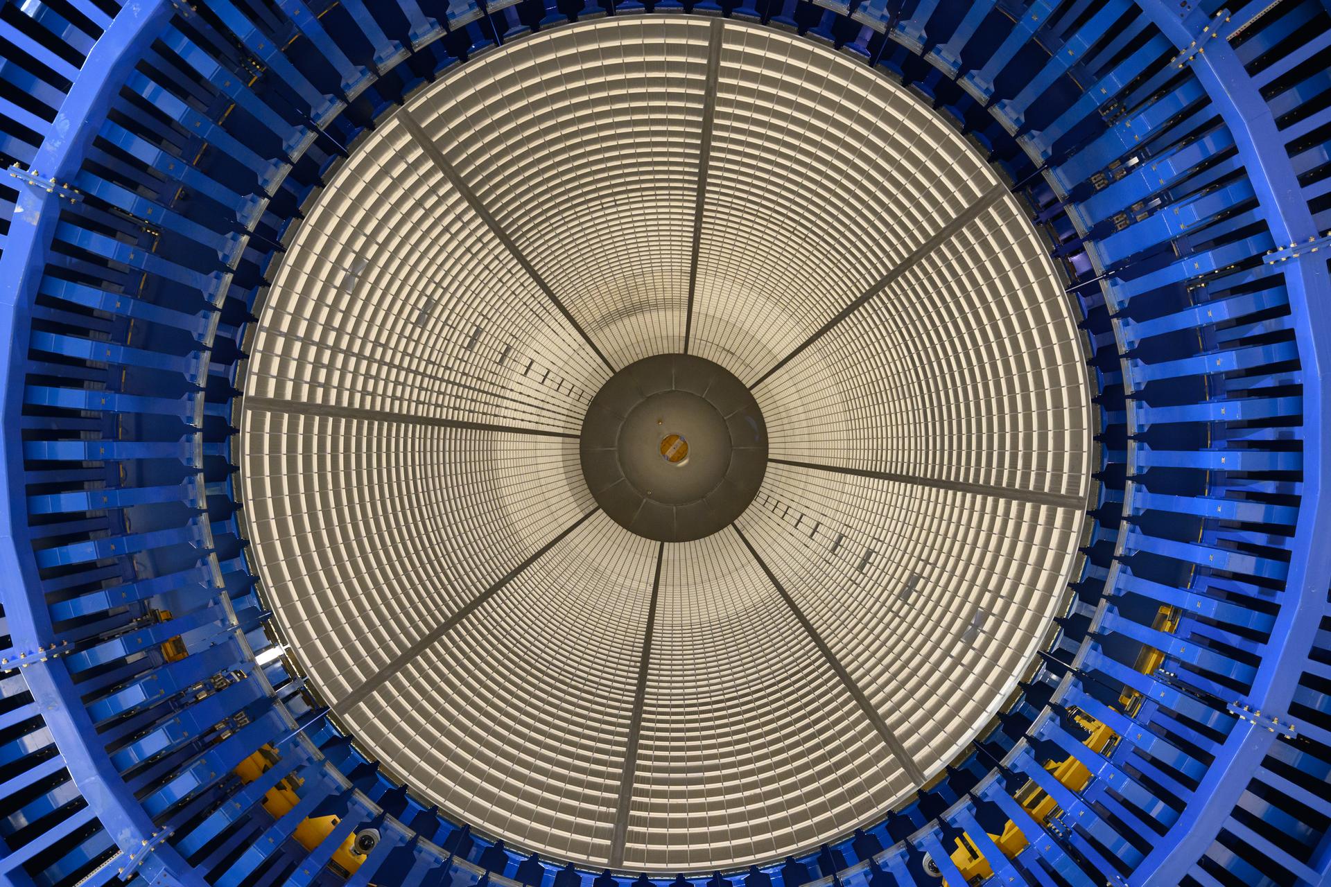 Move crews at NASA’s Michoud Assembly Facility in New Orleans lift the aft dome for the liquid hydrogen tank for the fourth core stage of NASA’s SLS (Space Launch System), into the in-feeder of the facility’s vertical assembly center. Once loaded into the production tool, teams with SLS prime contractor, Boeing, will circumferentially friction-stir weld the dome to the previously-welded forward dome and five barrels that make up the liquid hydrogen tank.         The SLS core stage liquid hydrogen tank holds 537,000 gallons of super-cooled propellant and is one of five unique elements that make up the SLS core stage. Together with the forward skirt, liquid oxygen tank, intertank, and engine section, the liquid hydrogen tank will provide propellant to the four RS-25 engines to produce more than two million pounds of thrust to help launch NASA’s Orion spacecraft, astronauts, and supplies beyond Earth’s orbit to the Moon.