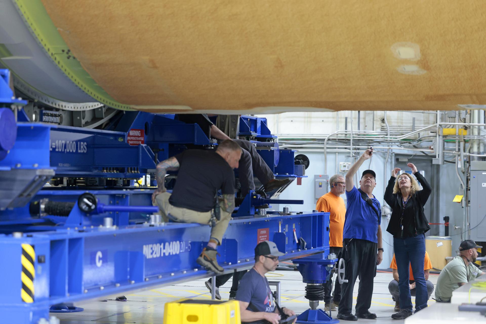 Teams with Boeing – NASA’s Prime Contractor for the agency’s SLS (Space Launch System) rocket – mate the forward and aft ends of the core stage for the agency’s Artemis III mission at NASA’s Michoud Assembly Facility in New Orleans on Jan. 8, 2026. This operation secures four of the five major components of the core stage in place: the forward skirt, liquid oxygen tank, intertank, and the liquid hydrogen tanks. The final component – the engine section – was structurally completed in 2022 and shipped to Kennedy Space Center for final assembly and integration. Now joined, teams will continue integrating critical systems and perform various checks and tests to ensure the hardware is ready for shipment to Kennedy later this year.    The core stage, along with its four RS-25 engines, produce more than two million pounds of thrust to help launch NASA’s Orion spacecraft, astronauts, and supplies beyond Earth’s orbit and to the lunar surface for Artemis.    Image credit: NASA/Michael DeMocker