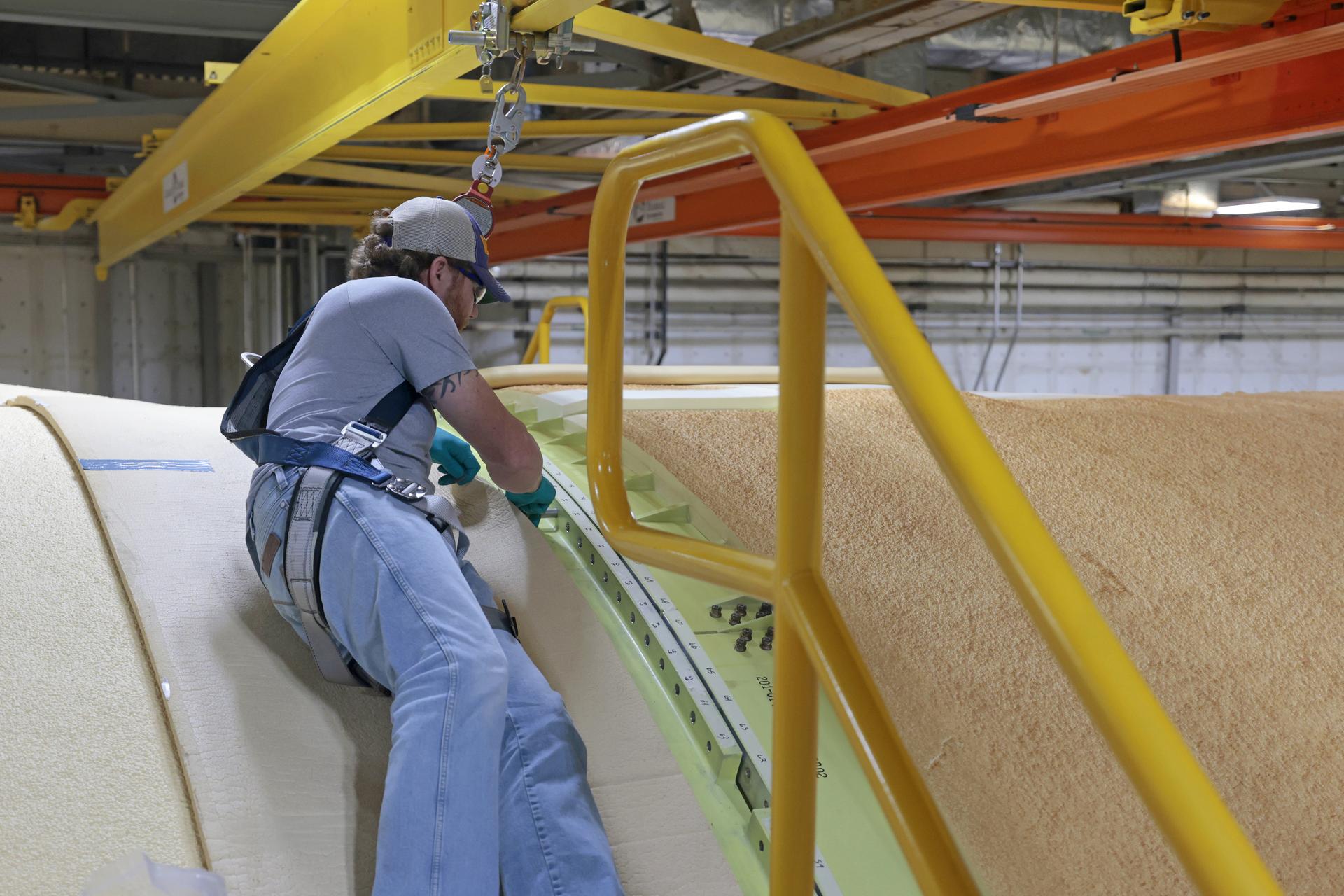 Teams with Boeing – NASA’s Prime Contractor for the agency’s SLS (Space Launch System) rocket – mate the forward and aft ends of the core stage for the agency’s Artemis III mission at NASA’s Michoud Assembly Facility in New Orleans on Jan. 8, 2026. This operation secures four of the five major components of the core stage in place: the forward skirt, liquid oxygen tank, intertank, and the liquid hydrogen tanks. The final component – the engine section – was structurally completed in 2022 and shipped to Kennedy Space Center for final assembly and integration. Now joined, teams will continue integrating critical systems and perform various checks and tests to ensure the hardware is ready for shipment to Kennedy later this year. The core stage, along with its four RS-25 engines, produce more than two million pounds of thrust to help launch NASA’s Orion spacecraft, astronauts, and supplies beyond Earth’s orbit and to the lunar surface for Artemis. Image credit: NASA/Michael DeMocker