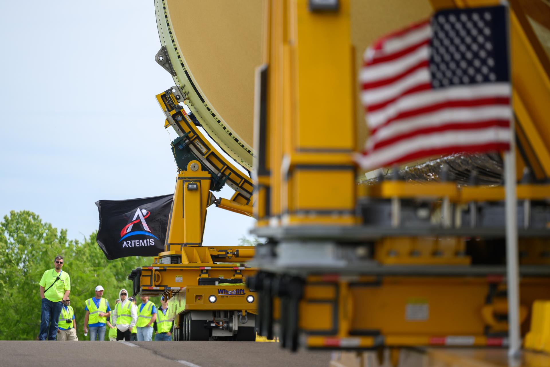 NASA moved the core stage, or the largest section, of the SLS (Space Launch System) rocket that will launch the crewed Artemis III mission in 2027 from the agency’s Michoud Assembly Facility to the agency’s Pegasus barge in New Orleans on April 20. The barge will ferry the top four-fifths – the section containing the liquid hydrogen tank, liquid oxygen tank, intertank, and forward skirt – of the SLS core stage to NASA’s Kennedy Space Center in Florida to complete outfitting and vertical integration.  Teams with NASA and Boeing, the SLS core stage lead contractor, used specialized transporters to guide the top four-fifths from the NASA rocket factory to Pegasus. Prior to the move, technicians added an engine section transportation simulator to the rocket stage for shipment to the Space Coast.  Next year’s Artemis III mission will launch astronauts to Earth’s orbit aboard the Orion spacecraft on top of SLS to test rendezvous and docking capabilities between Orion and commercial spacecraft needed to land Artemis IV astronauts on the Moon in 2028. NASA’s SLS is the only rocket capable of sending Orion, astronauts, and supplies to the Moon in a single launch.  Photo Credit: NASA/Eric Bordelon