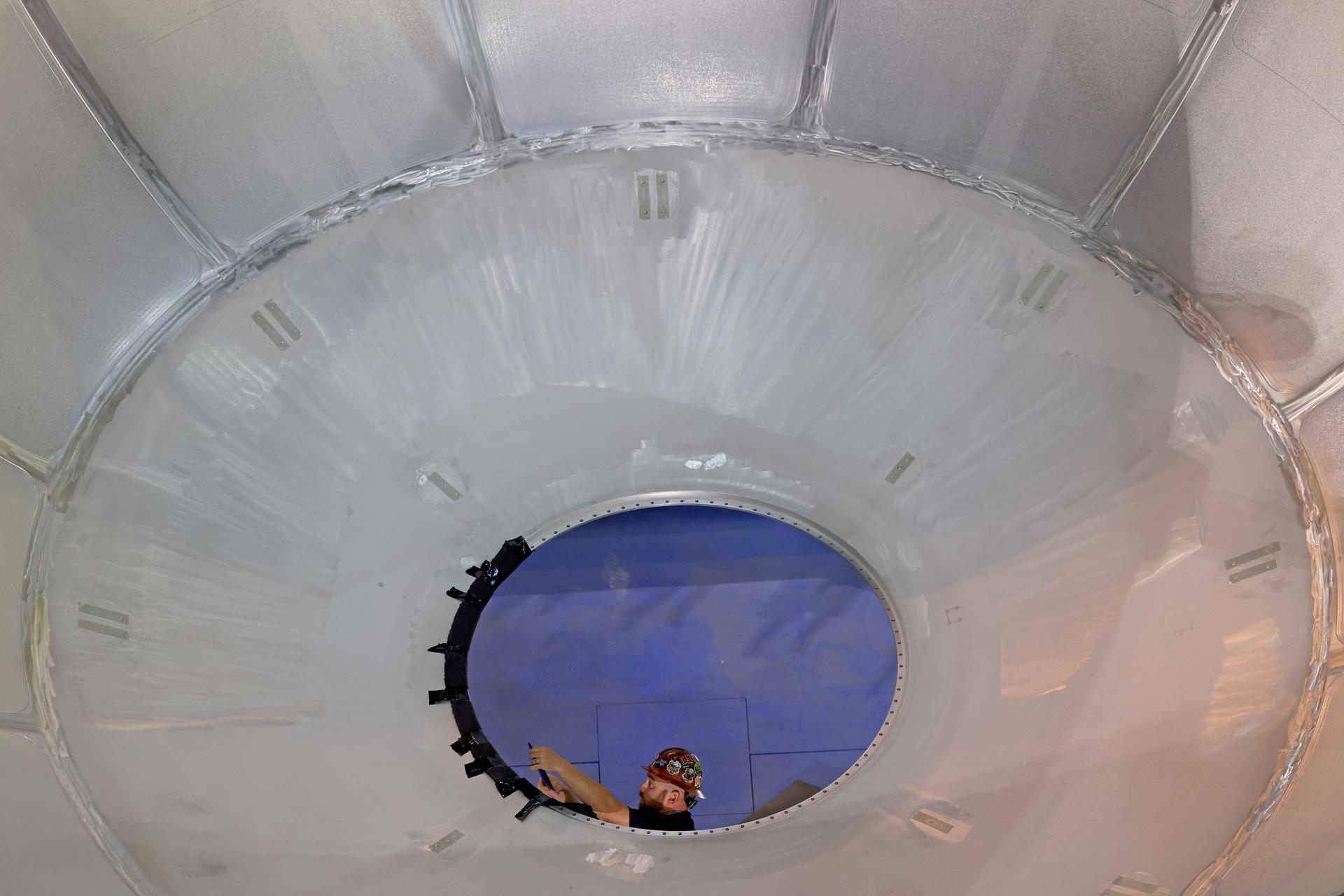 Teams at NASA’s Michoud Assembly Facility in New Orleans lift the aft dome for the liquid oxygen tank into the Vertical Assembly Center on May 11. The flight hardware will form part of the SLS (Space Launch System) rocket’s core stage for the Artemis IV mission. The aft dome is the final piece to complete the liquid oxygen tank structure. Inside the vertical assembly center – one of the largest friction-stir weld tools in the world – NASA and Boeing, SLS core stage prime contractor, will perform a circumferential weld to join the dome to the previously welded forward dome and two barrel structures to form the full liquid oxygen tank structure. The propellant tank is one of five major elements that make up the 212-foot-tall rocket stage. The core stage, along with its four RS-25 engines at its base, produces more than two million pounds of thrust to help launch NASA’s Orion spacecraft, astronauts, and supplies beyond Earth’s orbit and to the lunar surface for Artemis. Image credit: NASA/Michael DeMocker