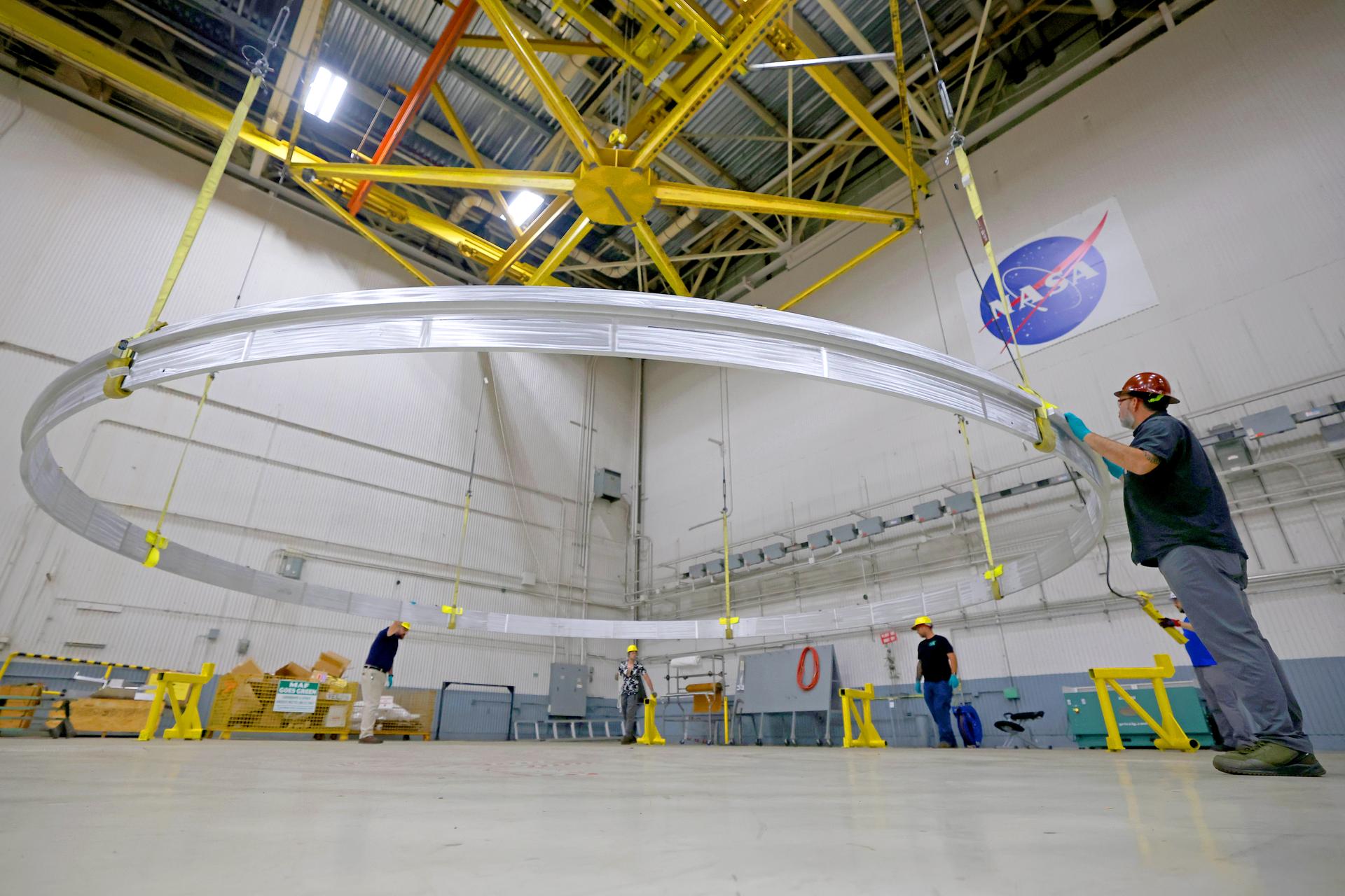 Teams at NASA’s Michoud Assembly Facility in New Orleans continue to make progress manufacturing core stages for the SLS (Space Launch System) rocket. In August, teams with NASA and Boeing, SLS core stage prime contractor, completed the first ring for the sixth SLS core stage. The core stage rings are welded together through a friction-stir welding process. A completed ring is 27.6 feet in diameter and serves as a connection point to join the large core stage structures together. The rings also provide structural stability to the bottoms of the domes. The 212-foot-tall SLS rocket core stage is made up of 10 major barrel sections, four dome sections, and seven rings. The components come together to form the five major sections of the core stage – the engine section, liquid hydrogen tank, intertank, liquid oxygen tank, and forward skirt.