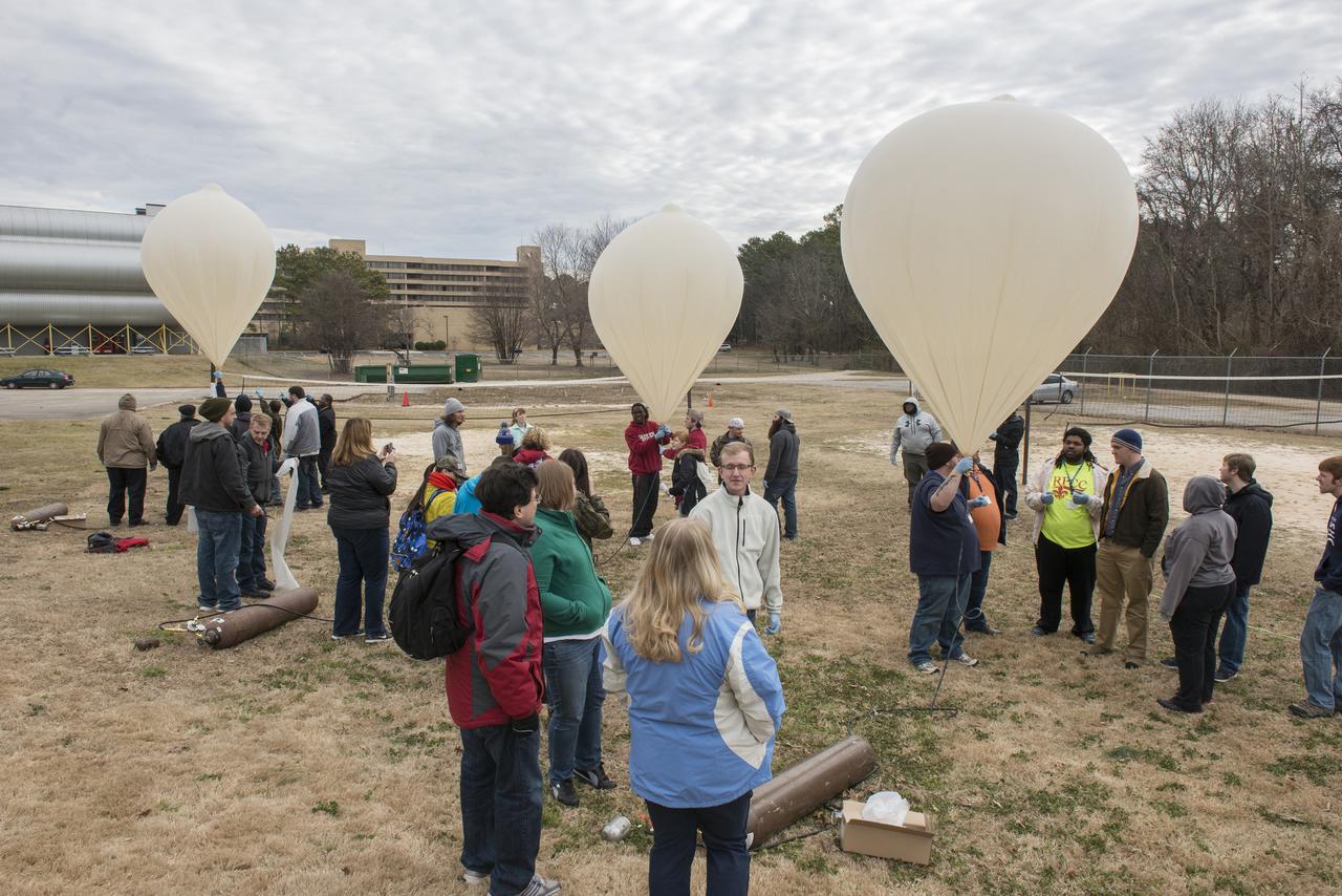 STUDENTS FROM COMMUNITY COLLEGES THROUGHOUT THE SOUTH CAME TOGETHER AT THE U.S. SPACE AND ROCKET CENTER FOR THE BALLOONSAT LAUNCH EVENT. EACH COMMUNITY COLLEGE TEAM ASSEMBLED ITS OWN PAYLOAD, DESIGNED TO DOWNLOAD SCIENTIFIC AND ATMOSPHERIC INFORMATION, AND THEN 2 WEATHER BALLOONS WERE SENT ALOFT TO APPROXIMATELY 100,000 FEET WITH THE PAYLOADS. THE PAYLOADS WERE RECOVERED IN N. GEORGIA AND TAKEN BACK TO THE INDIVIDUAL SCHOOLS FOR DOWNLOADING.
