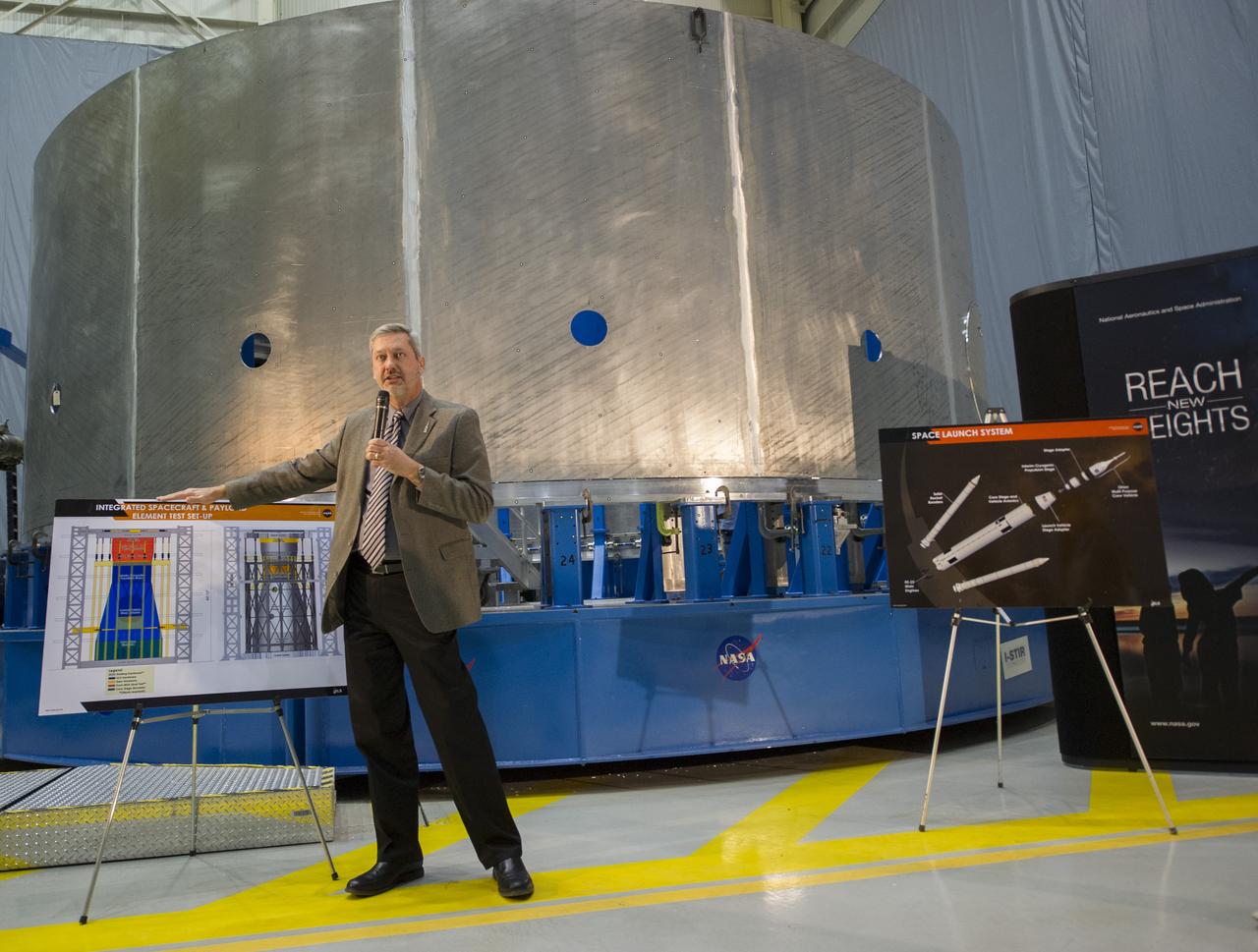 CHRISTOPHER CRUMBLY, MANAGER OF THE SPACECRAFT PAYLOAD INTEGRATION AND EVOLUTION OFFICE, GAVE VISITORS AN INSIDER'S PERSPECTIVE ON THE CORE STAGE SIMULATOR AT MARSHALL AND ITS IMPORTANCE TO DEVELOPMENT OF THE SPACE LAUNCH SYSTEM. CHRISTOPHER CRUMBLY, MANAGER OF THE SPACECRAFT PAYLOAD INTEGRATION AND EVOLUTION OFFICE, GAVE VISITORS AN INSIDER'S PERSPECTIVE ON THE CORE STAGE SIMULATOR AT MARSHALL AND ITS IMPORTANCE TO DEVELOPMENT OF THE SPACE LAUNCH SYSTEM.