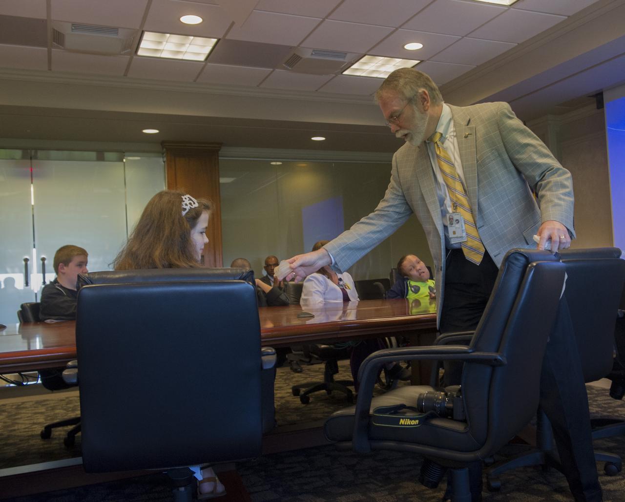 DALE THOMAS PASSES A TACTILE HARDWARE SAMPLE FOR STUDENTS FROM THE TENNESSEE SCHOOL FOR THE BLIND TO PASS AROUND DURING HIS WELCOME 
