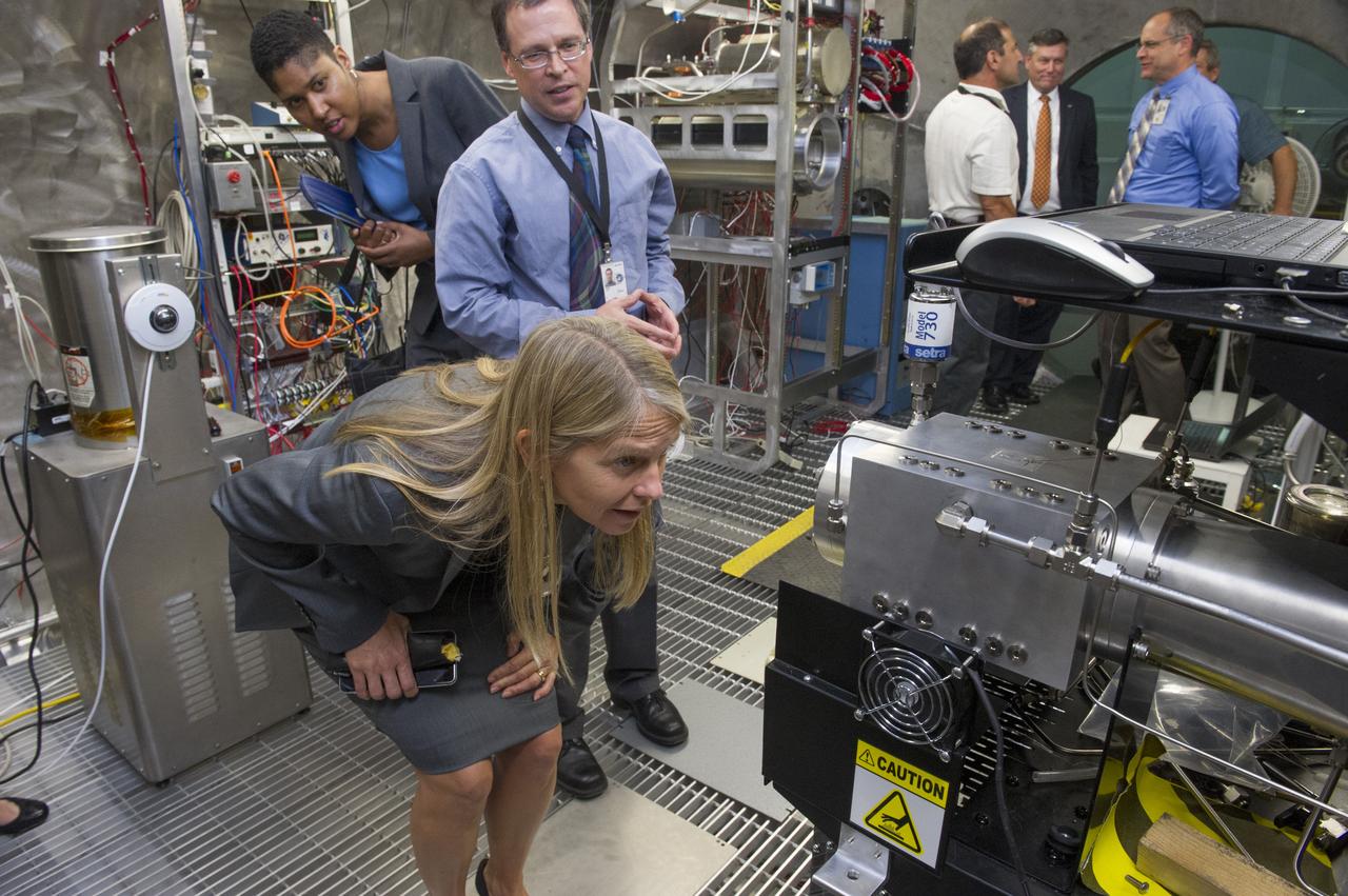 NEWMAN TAKES A CLOSER LOOK AT EQUIPMENT UNDER DEVELOPMENT IN THE ENVIRONMENTAL CONTROL & LIFE SUPPORT SYSTEMS SECTION IN BUILDING 4755. ELCSS IS BUILDING DEVICES TO RECYCLE AIR AND WATER FOR CREW MEMBERS ON THE INTERNATIONAL SPACE STATION, USING THE ORBITING LABORATORY AS A TEST BED FOR LIFE SUPPORT SYSTEMS ON LONG-DURATION MISSIONS DEEPER INTO OUR SOLAR SYSTEM.