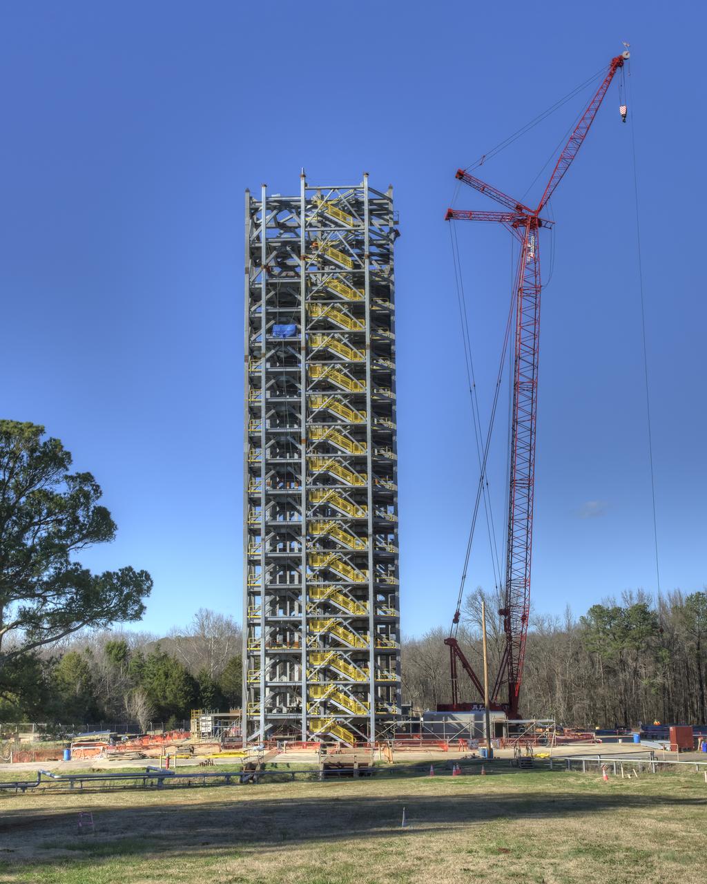Overall view of test stand 4693 in the west test area. The stand is scheduled to have another 3 story section added