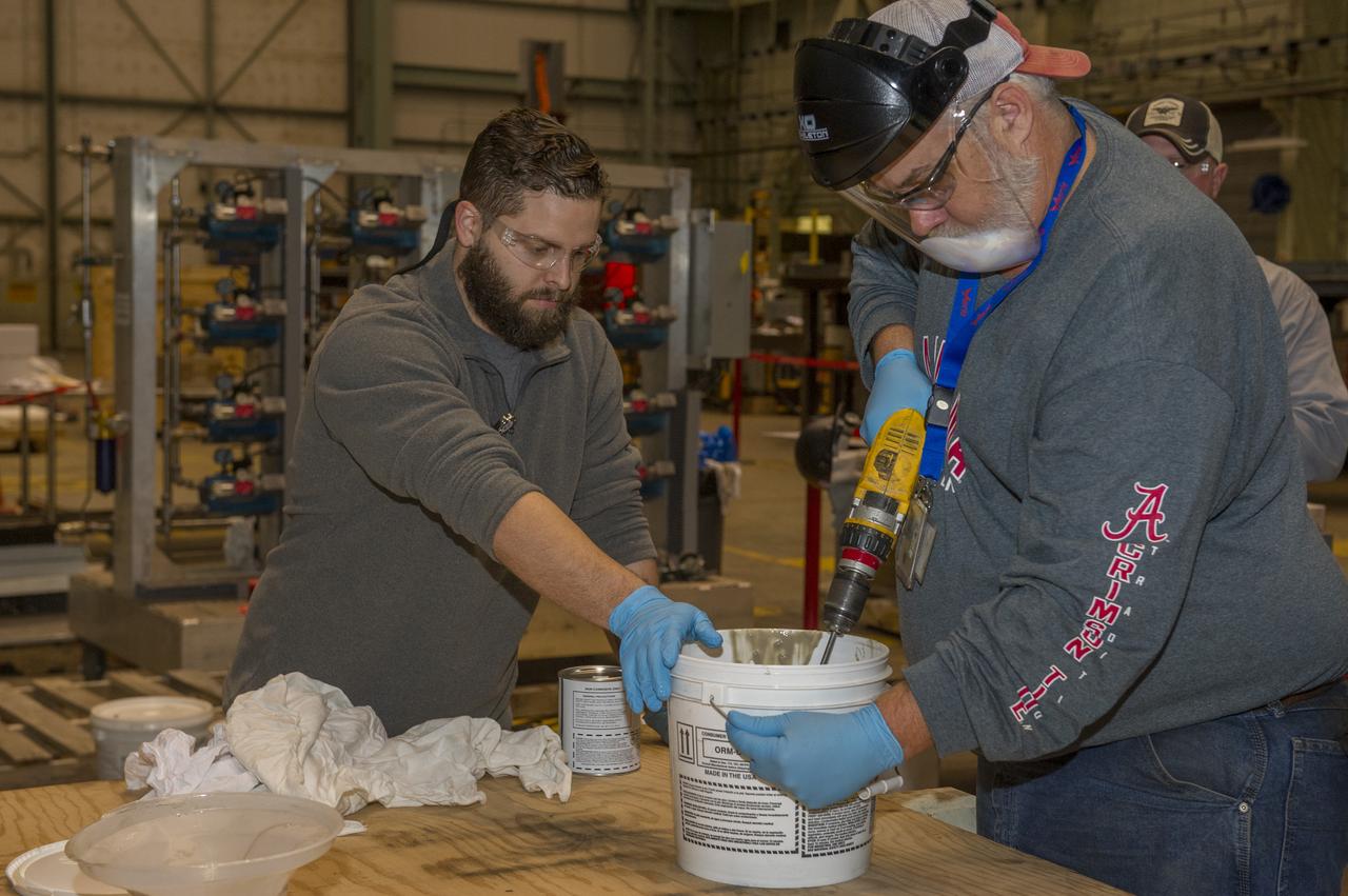 SHELL BUCKLE KNOCKDOWN FACTOR (SBKF) COMPOSITE BARREL EPOXY POUR.