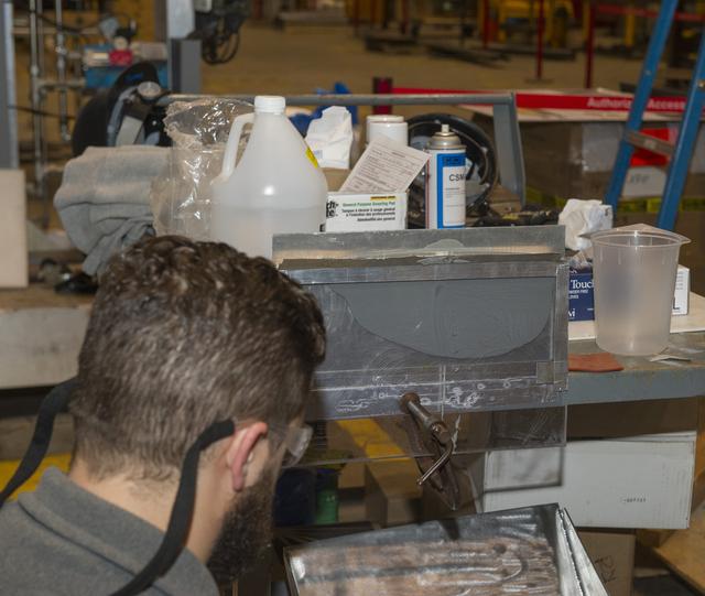 NASA image: MEASURING FLOW RATE OF EPOXY MIXTURE