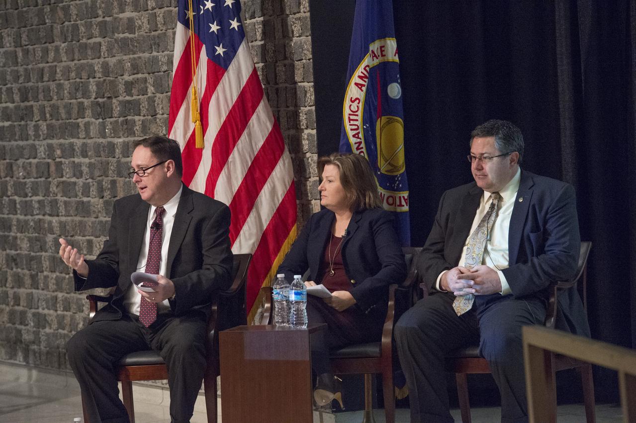 ROBERT LIGHTFOOT, LESA ROE, AND TODD MAY ONSTAGE DURING ALL HANDS MEETING
