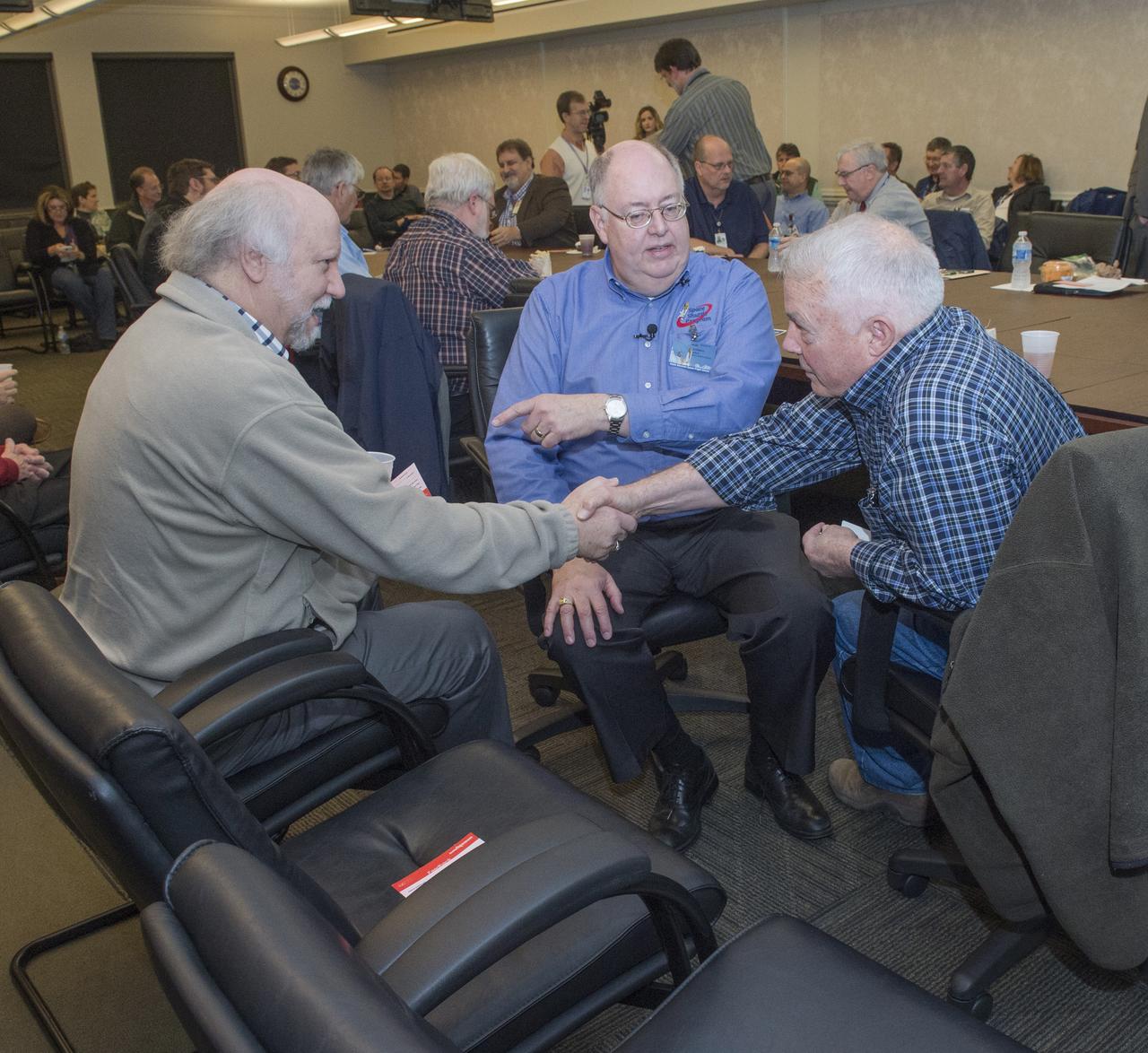 WAYNE HALE, (CENTER), INTRODUCES JOHN CHAPMAN (L) TO RETIRED BRIG. GENERAL/ASTRONAUT BOB STEWART