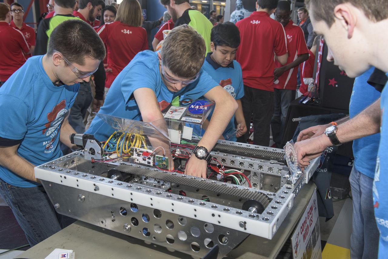 HIGH SCHOOL STUDENTS FROM NORTH ALABAMA GATHER AT THE U.S. SPACE AND ROCKET CENTER'S DAVIDSON CENTER FOR THE "ROBOTS TO ROCKET CITY" EVENT SHOWCASING THEIR INDIVIDUAL ROBOTS PRIOR TO LATER COMPETITIONS.
