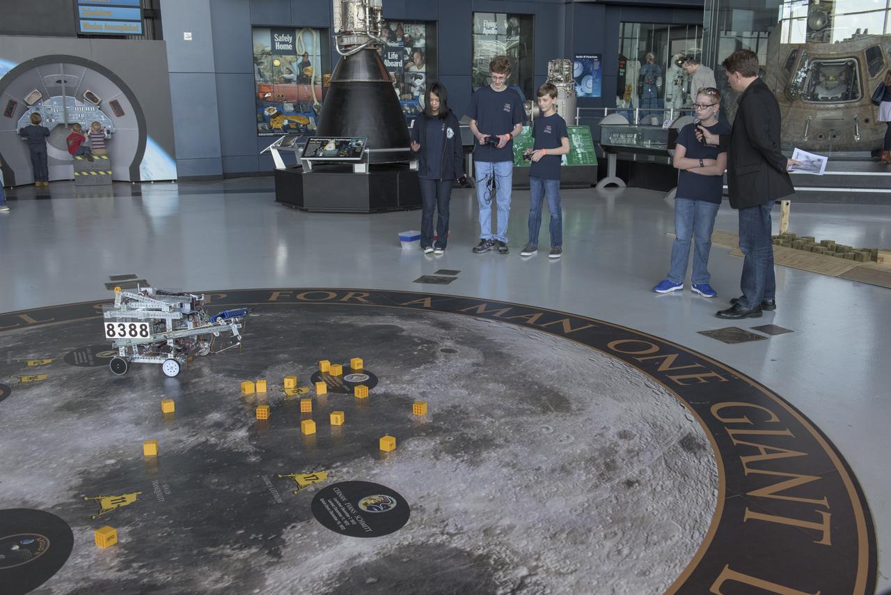 HIGH SCHOOL STUDENTS FROM NORTH ALABAMA GATHER AT THE U.S. SPACE AND ROCKET CENTER'S DAVIDSON CENTER FOR THE "ROBOTS TO ROCKET CITY" EVENT SHOWCASING THEIR INDIVIDUAL ROBOTS PRIOR TO LATER COMPETITIONS.