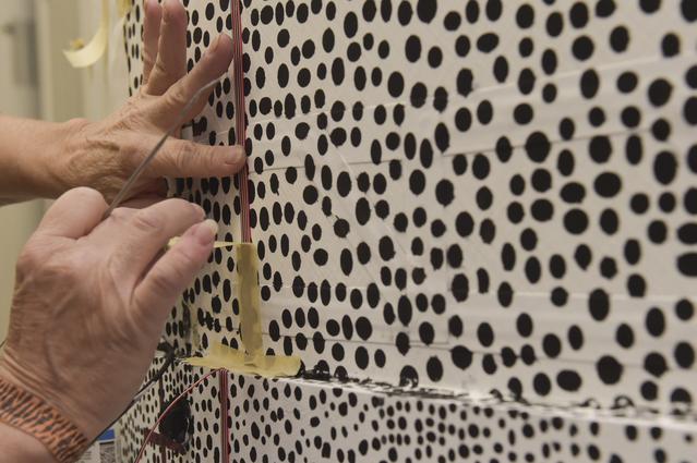 NASA image: INSTALLATION OF STRESS SENSORS TO SBKF COMPOSITE TANK