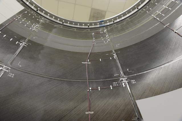 NASA image: INSTALLATION OF STRESS SENSORS TO SBKF COMPOSITE TANK