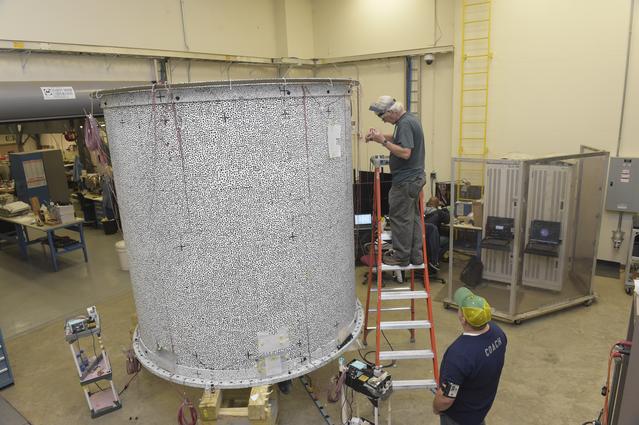NASA image: INSTALLATION OF STRESS SENSORS TO SBKF COMPOSITE TANK
