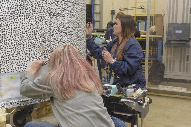 NASA image: INSTALLATION OF STRESS SENSORS TO SBKF COMPOSITE TANK