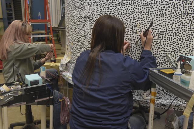 NASA image: INSTALLATION OF STRESS SENSORS TO SBKF COMPOSITE TANK