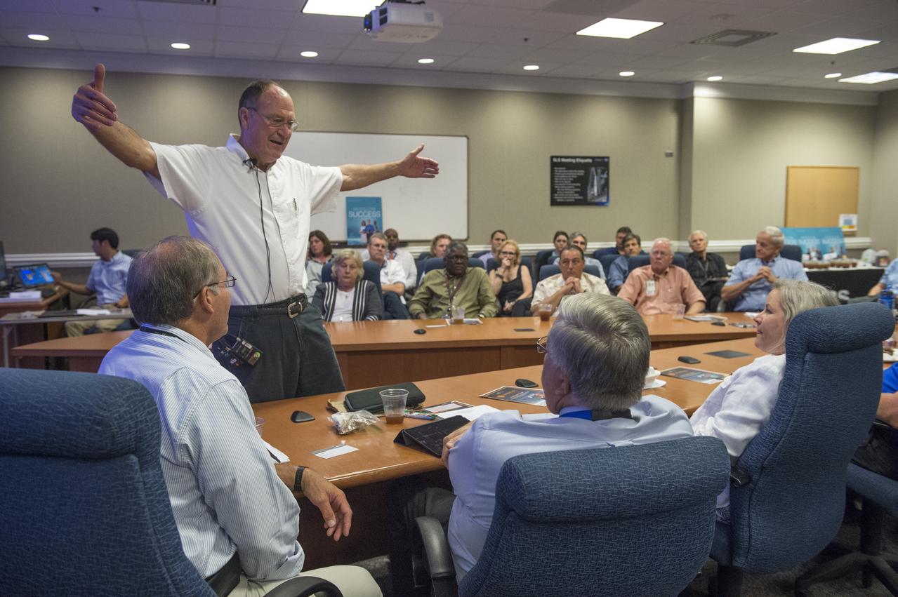 MICHAEL "RUDI" RUDOLPHI GESTURES DURING A "MISSION SUCCESS IS IN OUR HANDS" SHARED EXPERIENCES FORUM JUNE 16, WHERE HE SPOKE ABOUT HIS "UNFORGETTABLE" EXPERIENCES AS A SENIOR NASA REPRESENTATIVE OVERSEEING DEBRIS RECOVERY EFFORTS FOLLOWING THE LOSS OF SPACE SHUTTLE COLUMBIA AND ITS CREW.