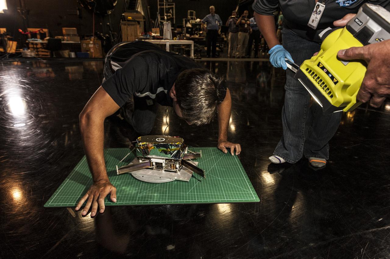 NEAR EARTH ASTEROID (NEA) SAIL TEAM PERFORMING A DEPLOYMENT OF THE FLIGHT-LIKE ENGINEERING DEVELOPMENT UNIT SOLAR SAIL. THE SAIL WAS MANUFACTURED AT NEXOLVE (HSV, AL) AND DEPLOYED FOR THE FIRST TIME AT MSFC ON AUGUST 4TH, 2016