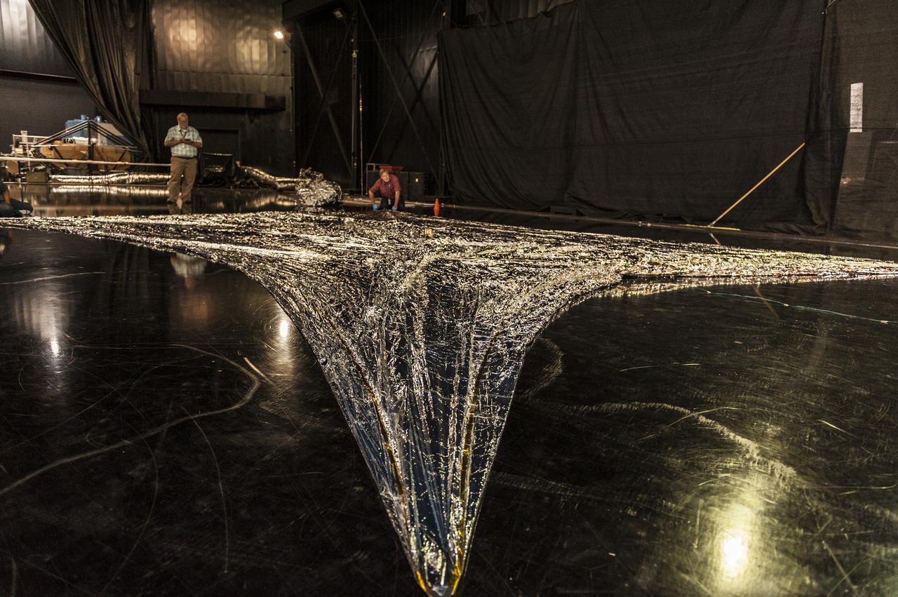 NEAR EARTH ASTEROID (NEA) SAIL TEAM PERFORMING A DEPLOYMENT OF THE FLIGHT-LIKE ENGINEERING DEVELOPMENT UNIT SOLAR SAIL. THE SAIL WAS MANUFACTURED AT NEXOLVE (HSV, AL) AND DEPLOYED FOR THE FIRST TIME AT MSFC ON AUGUST 4TH, 2016