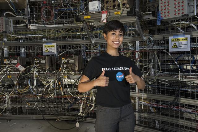 NASA image: RATANA MEEKHAM, AN ELECTRICAL INTEGRATION TECHNICIAN FOR QUALIS CORP. OF HUNTSVILLE, ALABAMA, HELPS TEST AVIONICS -- COMPLEX VEHICLE SYSTEMS ENABLING NAVIGATION, COMMUNICATIONS AND OTHER FUNCTIONS CRITICAL TO HUMAN SPACEFLIGHT