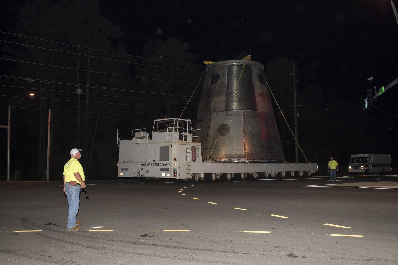 A SLS LAUNCH VEHICLE STAGE ADAPTER IS MOVED FROM THE VERTICAL WELD TOOL STATION IN MSFC’S BUILDING 4755 TO THE WEST TEST AREA’S TEST STAND 4699 WHERE IT WILL UNDERGO FURTHER TESTING OF ITS ABILITY TO WITHSTAND THE STRESSES RELATED TO LAUNCH AND SPACE TRAVEL.
