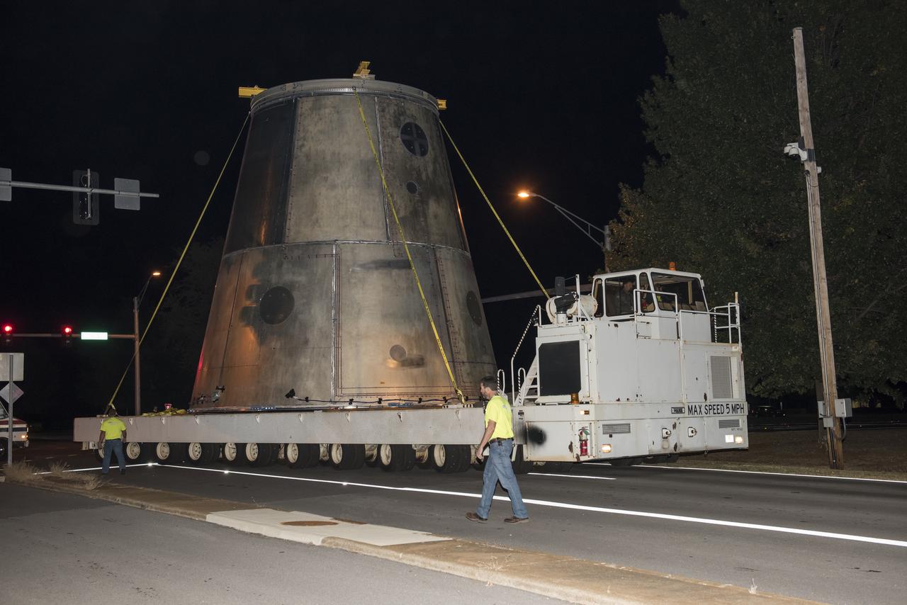A SLS LAUNCH VEHICLE STAGE ADAPTER IS MOVED FROM THE VERTICAL WELD TOOL STATION IN MSFC’S BUILDING 4755 TO THE WEST TEST AREA’S TEST STAND 4699 WHERE IT WILL UNDERGO FURTHER TESTING OF ITS ABILITY TO WITHSTAND THE STRESSES RELATED TO LAUNCH AND SPACE TRAVEL.