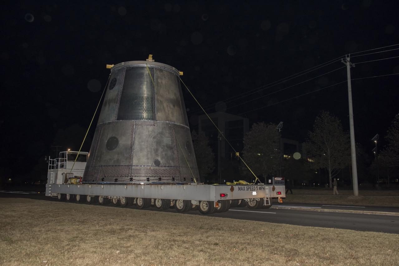 A SLS LAUNCH VEHICLE STAGE ADAPTER IS MOVED FROM THE VERTICAL WELD TOOL STATION IN MSFC’S BUILDING 4755 TO THE WEST TEST AREA’S TEST STAND 4699 WHERE IT WILL UNDERGO FURTHER TESTING OF ITS ABILITY TO WITHSTAND THE STRESSES RELATED TO LAUNCH AND SPACE TRAVEL.