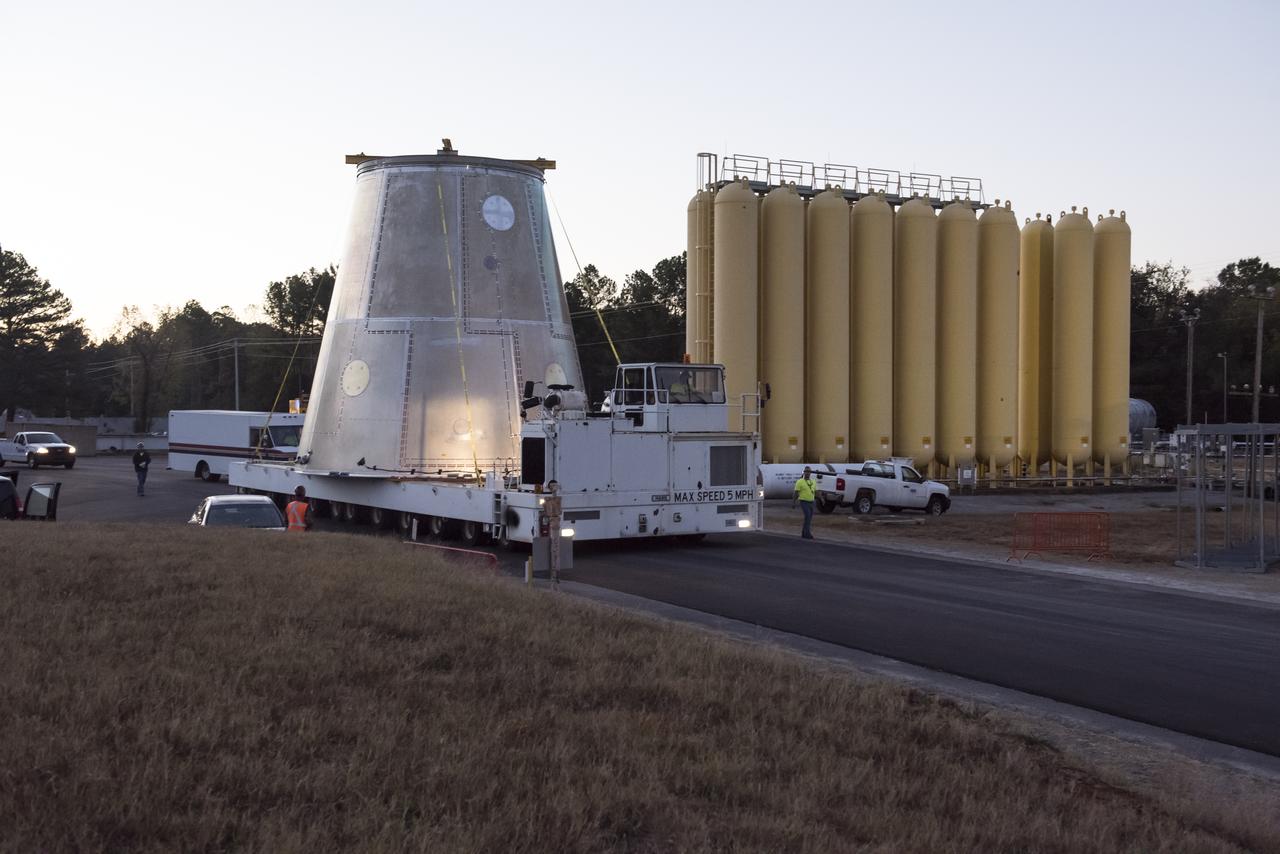 A SLS LAUNCH VEHICLE STAGE ADAPTER IS MOVED FROM THE VERTICAL WELD TOOL STATION IN MSFC’S BUILDING 4755 TO THE WEST TEST AREA’S TEST STAND 4699 WHERE IT WILL UNDERGO FURTHER TESTING OF ITS ABILITY TO WITHSTAND THE STRESSES RELATED TO LAUNCH AND SPACE TRAVEL.