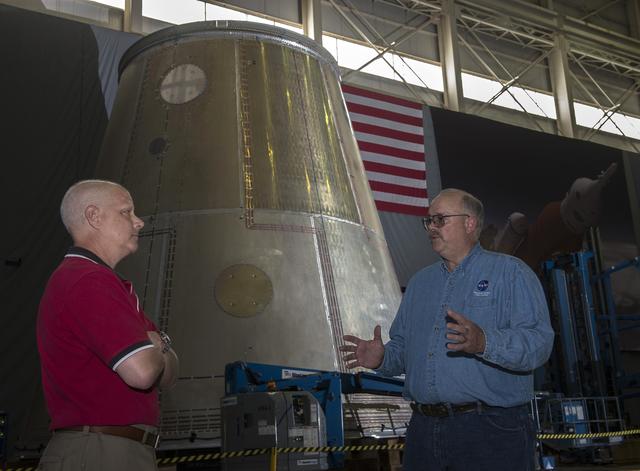 NASA image: RICK BURT AND ANDY SCHORR WITH LAUNCH VEHICLE STAGE ADAPTER