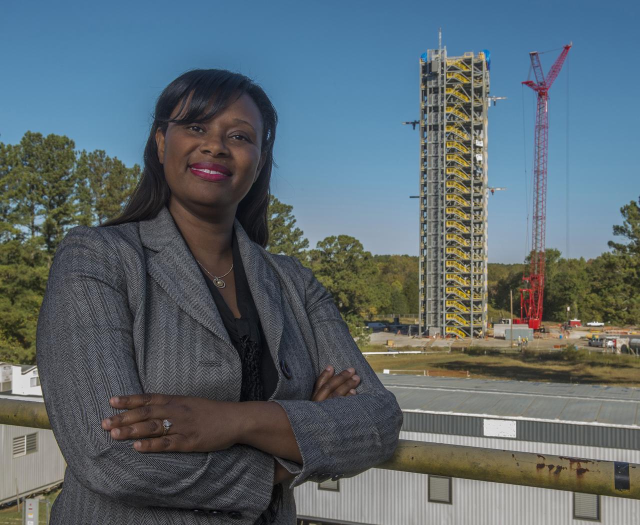 DAWN STANLEY POSES IN FRONT OF TEST STAND 4693, FOR ARTICLE IN FORBES MAGAZINE WEBSITE ABOUT WOMEN IN TECHNOLOGY