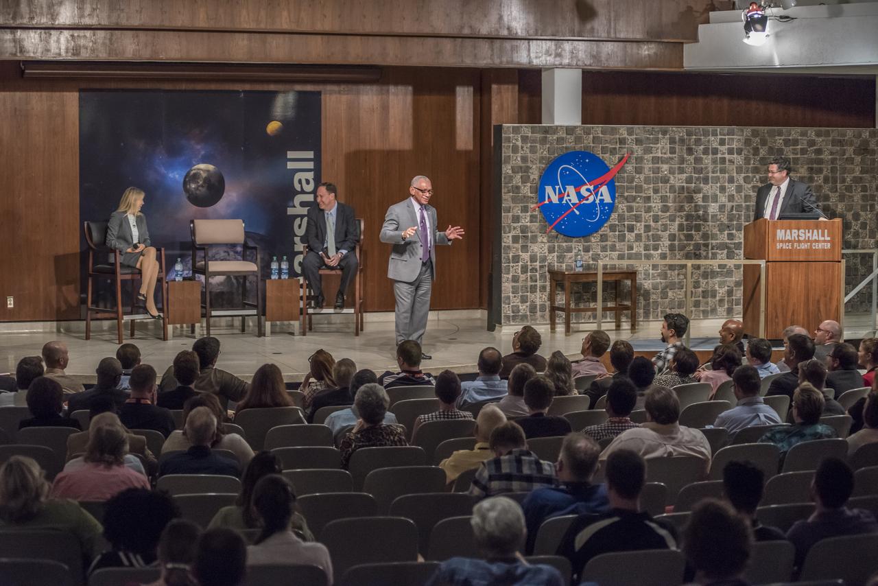 NASA ADMINISTRATOR CHARLES BOLDEN TALKS WITH MARSHALL SPACE FLIGHT CENTER TEAM MEMBERS IN MORRIS AUDITORIUM DURING AN ALL-HANDS MEETING OCT. 27. BOLDEN SAID NASA'S PROGRESS ON THE SPACE LAUNCH SYSTEM AND OTHER PROGRAMS -- MILESTONES DELIVERED BY THE WORKFORCE AT MARSHALL AND AGENCY WIDE -- SHOULD ALLAY CONCERNS ABOUT MISSION CHANGES ASSOCIATED WITH A NEW PRESIDENT AND ADMINISTRATION. "I WANTED TO THANK ALL OF YOU," HE SAID. "WE'RE THE BEST SPACE PROGRAM IN THE WORLD. I COULD NOT BE MORE CONFIDENT." ON STAGE WITH BOLDEN ARE, FROM RIGHT, MARSHALL DIRECTOR TODD MAY, ASSOCIATE ADMINISTRATOR ROBERT LIGHTFOOT AND DEPUTY ADMINISTRATOR DAVA NEWMAN.