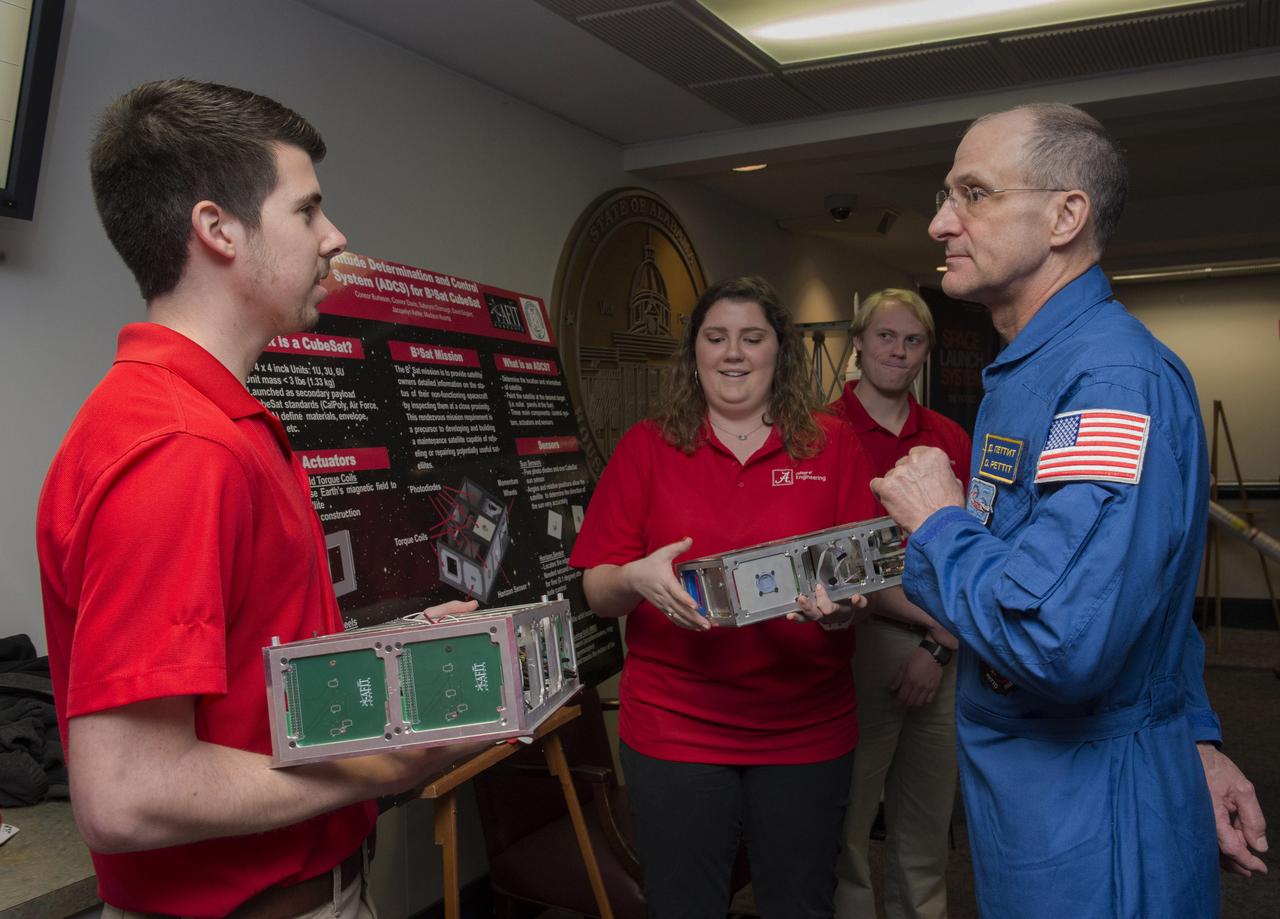 NASA ASTRONAUT DON PETTIT, RIGHT, A VETERAN OF THREE SPACEFLIGHTS, DISCUSSES CUBESAT TECHNOLOGY WITH UNIVERSITY OF ALABAMA IN TUSCALOOSA STUDENTS, FROM LEFT, DAVID ENGLERT, MADISON KOONTZ AND CONNOR BURLESON.