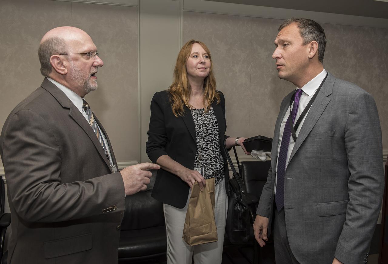THOMAS ZURBUCHEN, RIGHT, NASA ASSOCIATE ADMINISTRATOR FOR THE SCIENCE MISSION DIRECTORATE, SPEAKS WITH DENNON CLARDY, LEFT, DEPUTY MANAGER OF THE SCIENCE & TECHNOLOGY OFFICE AT NASA’S MARSHALL SPACE FLIGHT CENTER IN HUNTSVILLE, ALABAMA, AND SHAWN MCINERY, AFTER HIS KEYNOTE ADDRESS AT THE MARCH 21 LUNCHEON MEETING OF THE MARSHALL ASSOCIATION. ZURBUCHEN, WHO ASSUMED HIS NEW ROLE IN OCTOBER 2016, ALSO TOURED KEY MARSHALL MANUFACTURING AND TEST FACILITIES. THE MARSHALL ASSOCIATION IS THE CENTER’S PROFESSIONAL, EMPLOYEE SERVICE ORGANIZATION. 