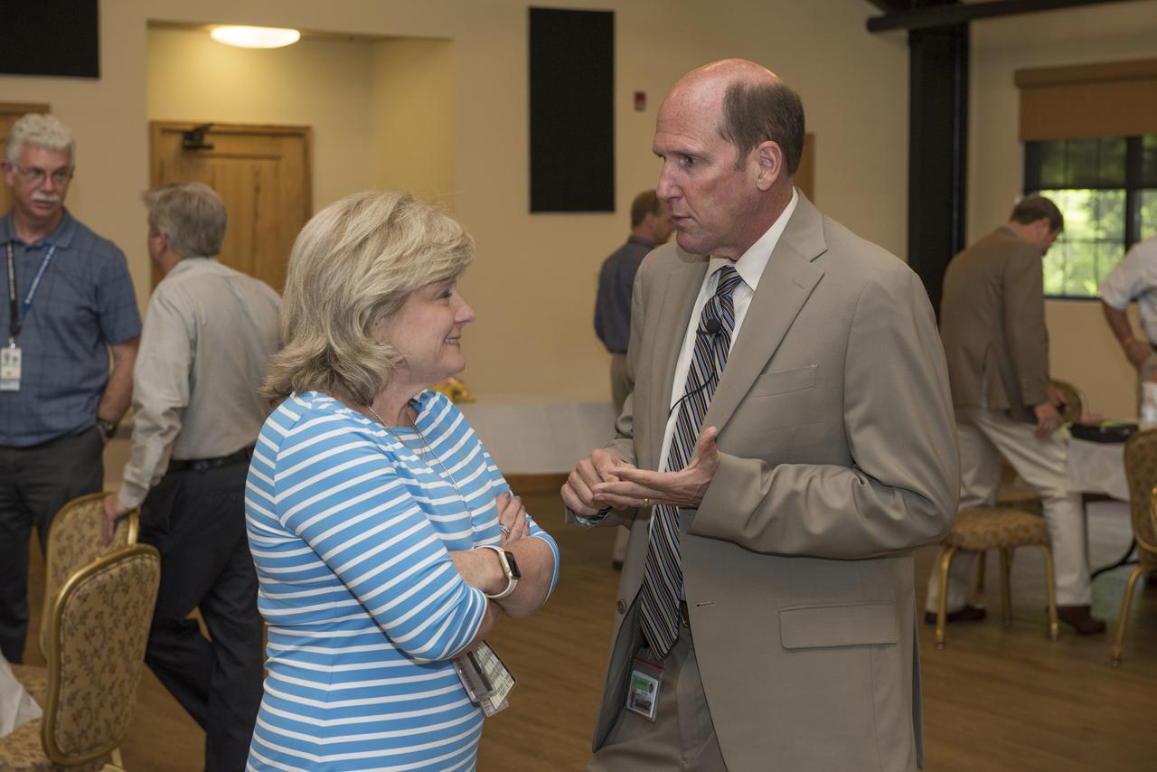 Paul Finley, mayor of the City of Madison, Alabama, chats with Jody Singer, deputy director of NASA’s Marshall Space Flight Center, following the April 26 lunch meeting of the Marshall Association, the center's professional, employee service organization. Finley, the guest speaker for the event, served as mayor of Madison from 2008-2012 and was elected to the post again in 2016.