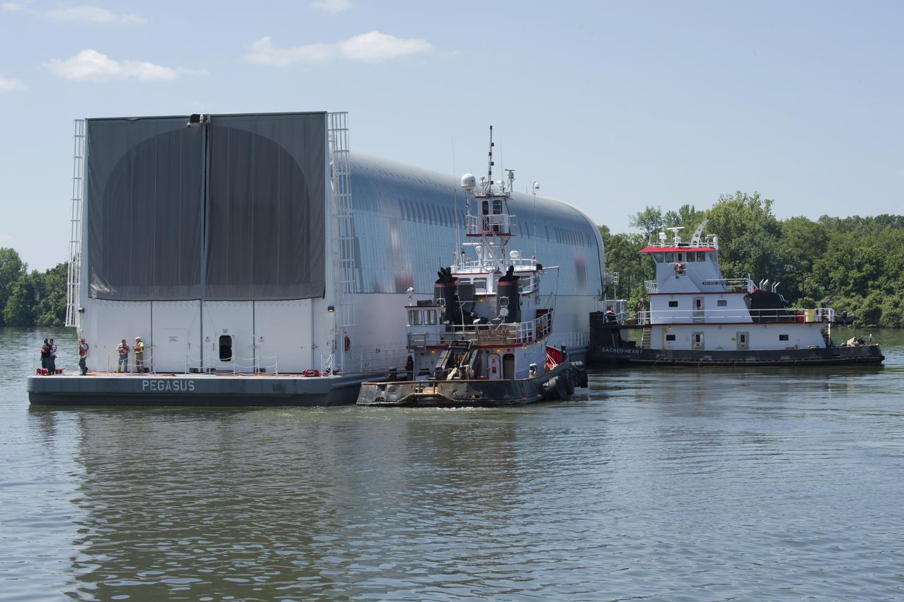 NASA’s barge, Pegasus, approaches the barge dock on Redstone Arsenal, home to the Marshall Space Flight Center. Pegasus is transporting the RS-25 engine core stage test article from the Michoud Assembly Facility to Marshall for structural testing.