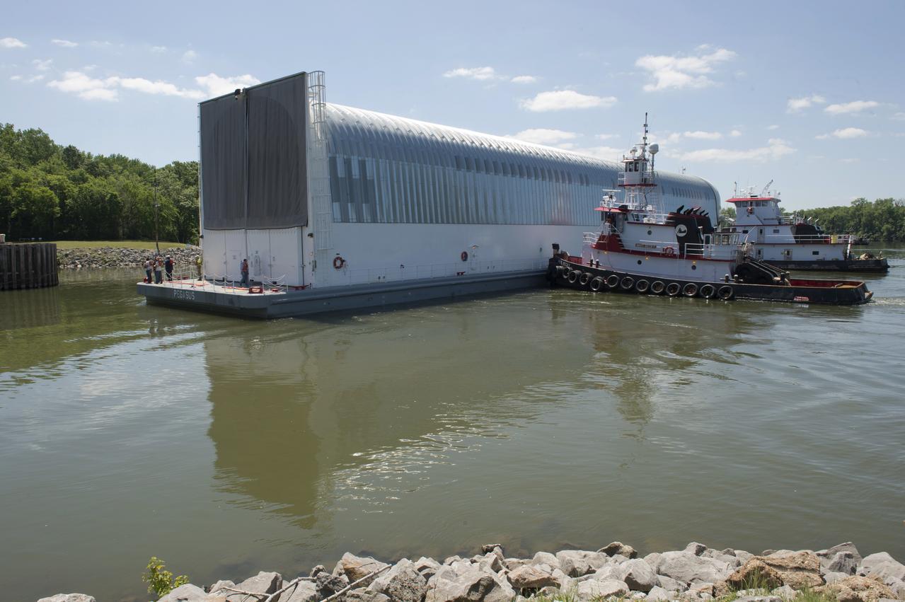 NASA’s barge, Pegasus, approaches the barge dock on Redstone Arsenal, home to the Marshall Space Flight Center. Pegasus is transporting the RS-25 engine core stage test article from the Michoud Assembly Facility to Marshall for structural testing.