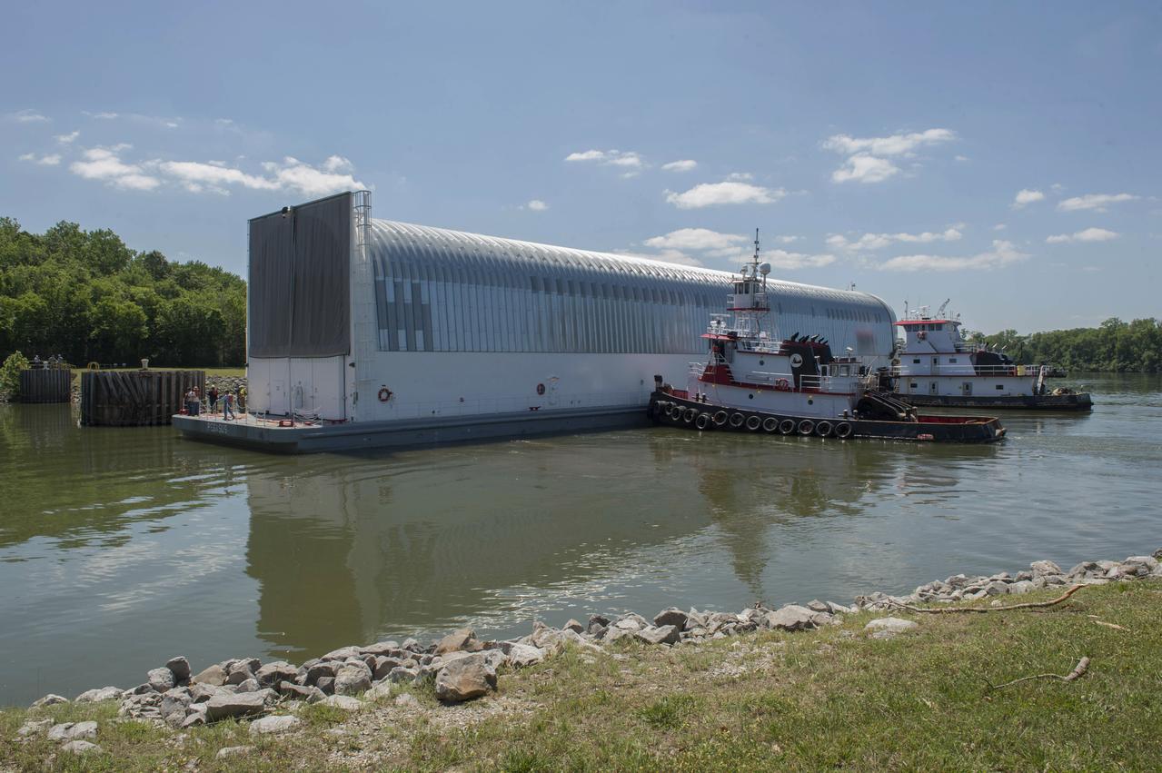 NASA’s barge, Pegasus, approaches the barge dock on Redstone Arsenal, home to the Marshall Space Flight Center. Pegasus is transporting the RS-25 engine core stage test article from the Michoud Assembly Facility to Marshall for structural testing.