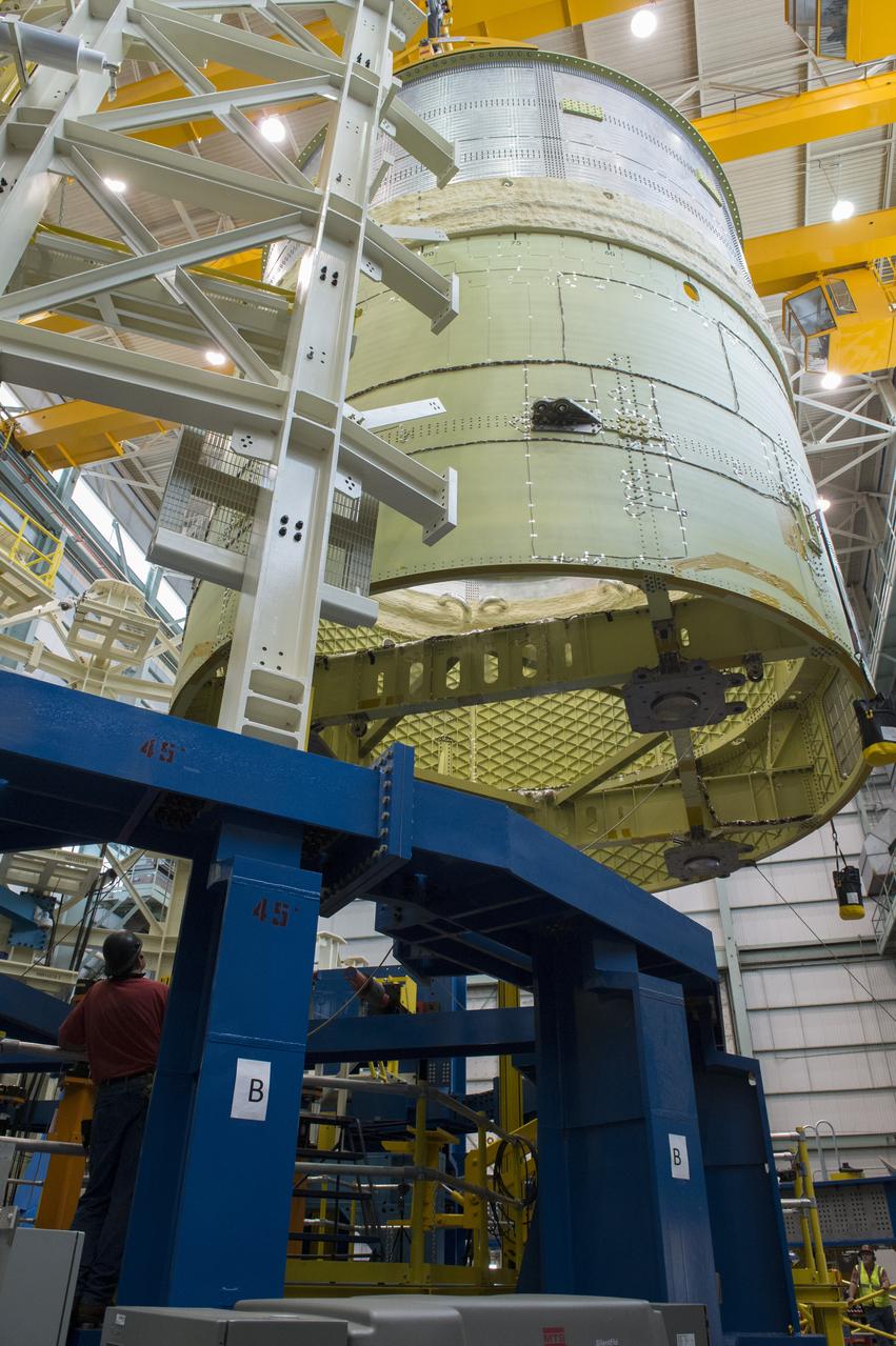 NASA engineers install test hardware for the agency's new heavy lift rocket, the Space Launch System, into a newly constructed 50-foot structural test stand at NASA's Marshall Space Flight Center. In the stand, hydraulic cylinders will be electronically controlled to push, pull, twist and bend the test article with millions of pounds of force. Engineers will record and analyze over 3,000 channels of data for each test case to verify the capabilities of the engine section and validate that the design and analysis models accurately predict the amount of loads the core stage can withstand during launch and ascent. The engine section, recently delivered via NASA's barge Pegasus from NASA's Michoud Assembly Facility, is the first of four core stage structural test articles scheduled to be delivered to Marshall for testing. The engine section, located at the bottom of SLS's massive core stage, will house the rocket's four RS-25 engines and be an attachment point for the two solid rocket boosters.