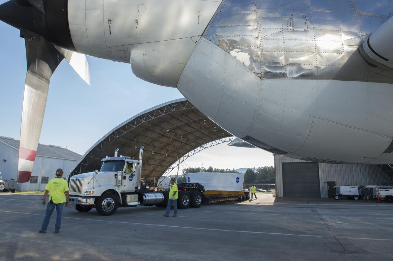The Orion stage adapter arrives at Redstone Airfield where it will be loaded into NASA's Super Guppie aircraft for transportation to Denver, Colorado where it will undergo further testing.